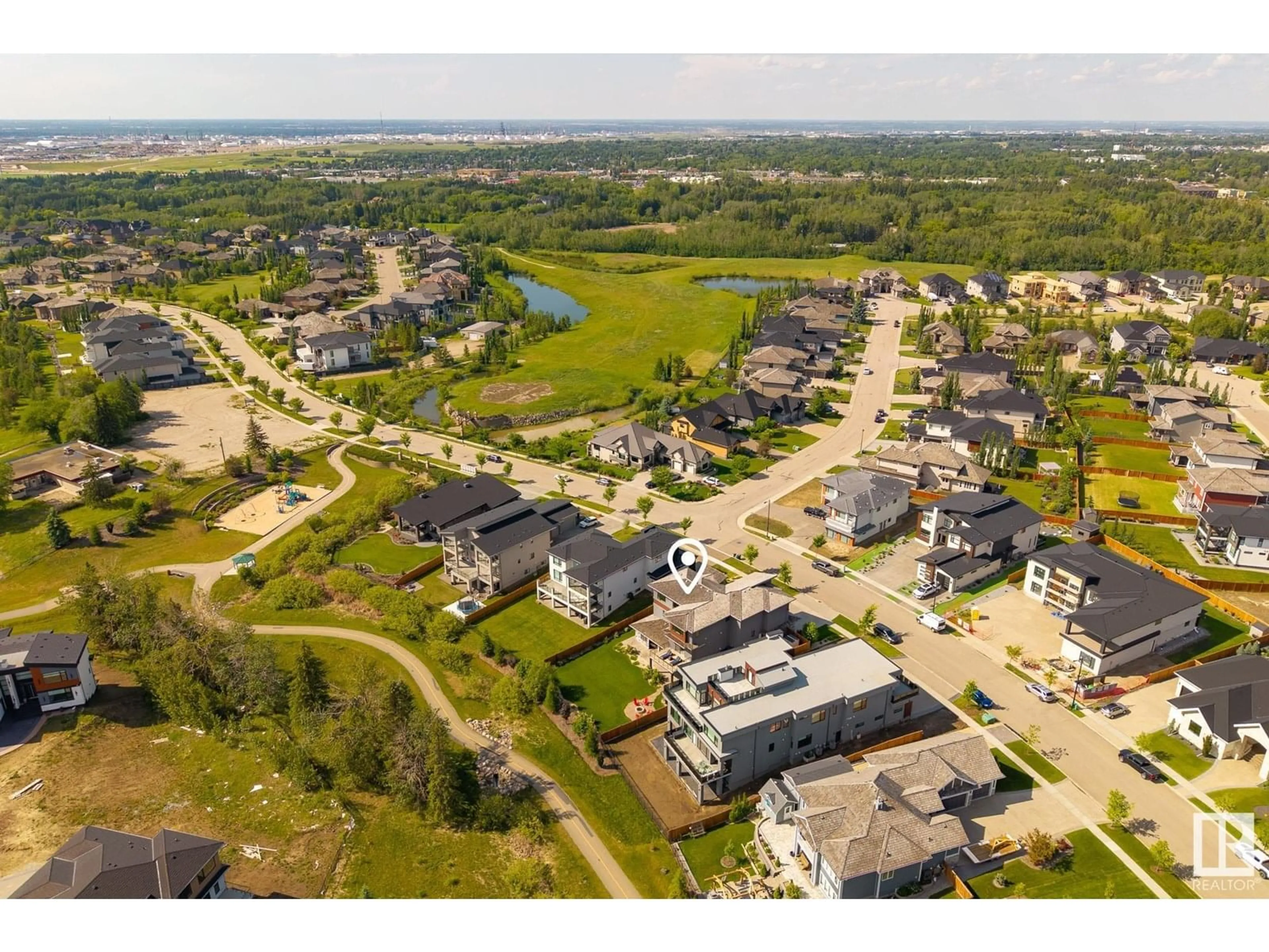 A pic from outside/outdoor area/front of a property/back of a property/a pic from drone, street for 52327 - 170 RGE ROAD 233, Rural Strathcona County Alberta T8B1C6