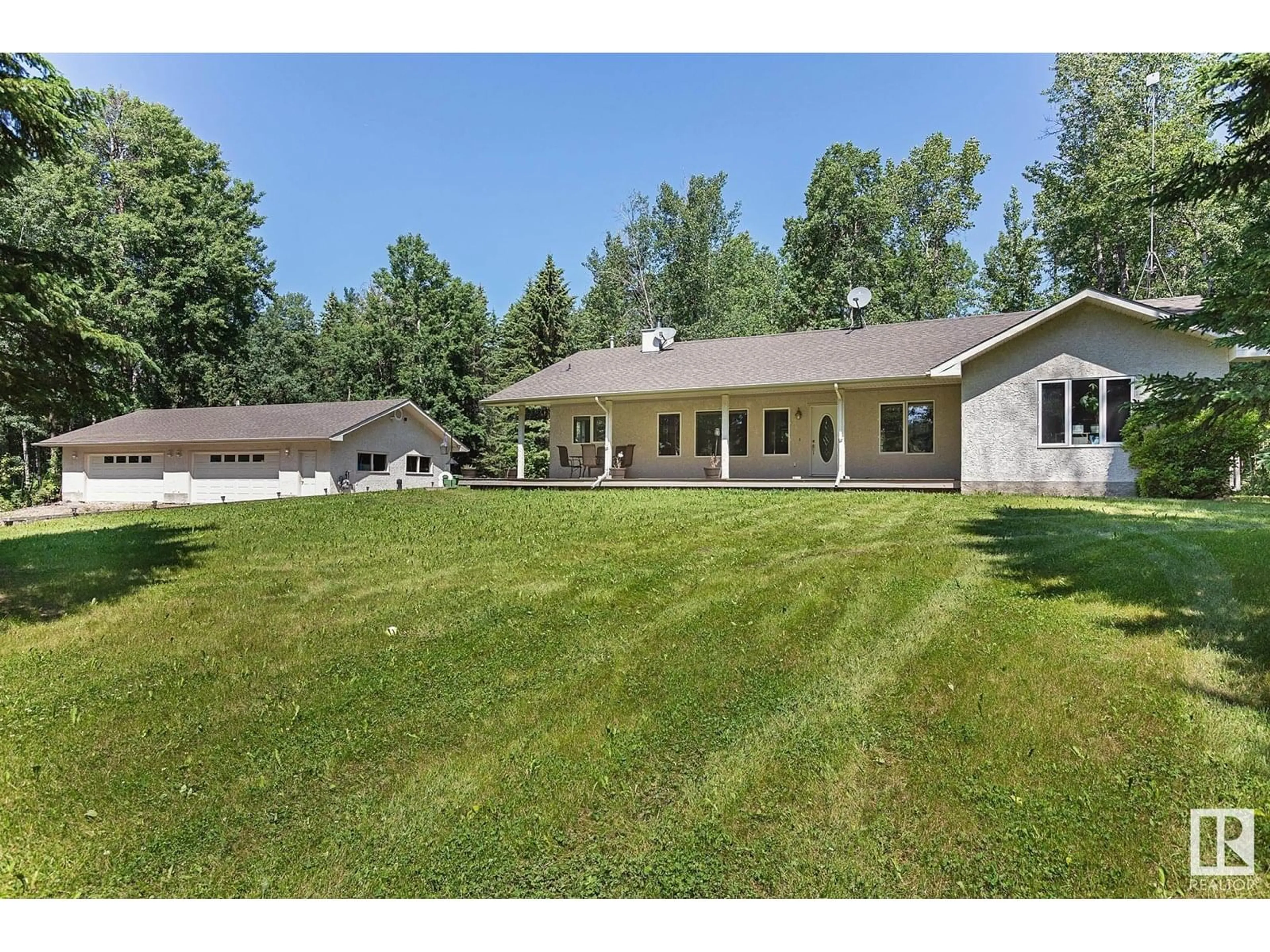 A pic from outside/outdoor area/front of a property/back of a property/a pic from drone, unknown for #9 - 53220 RGE ROAD 25, Rural Parkland County Alberta T7Y0E1