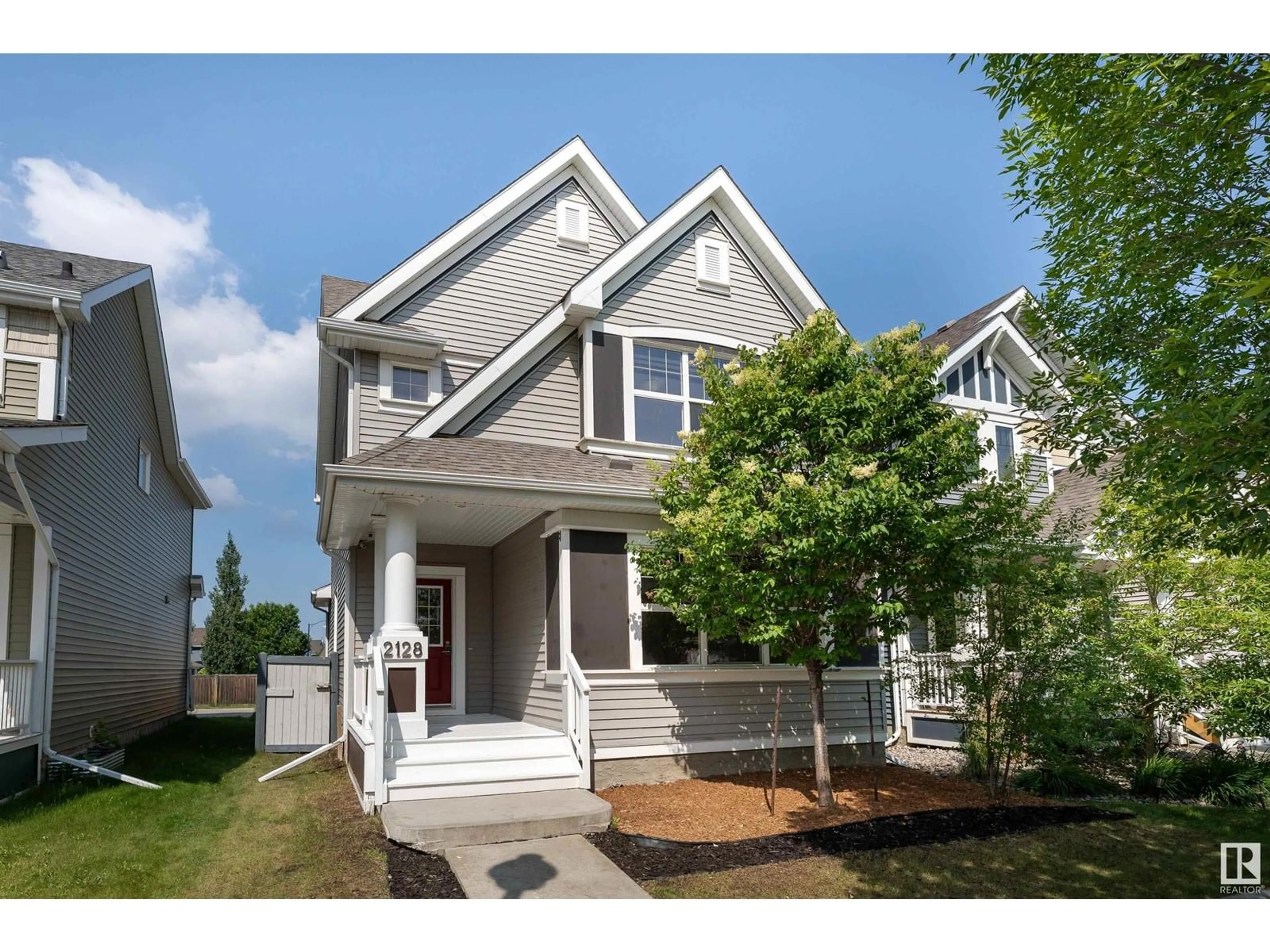 Home with vinyl exterior material, street for SW - 2128 74 ST, Edmonton Alberta T6X0L6