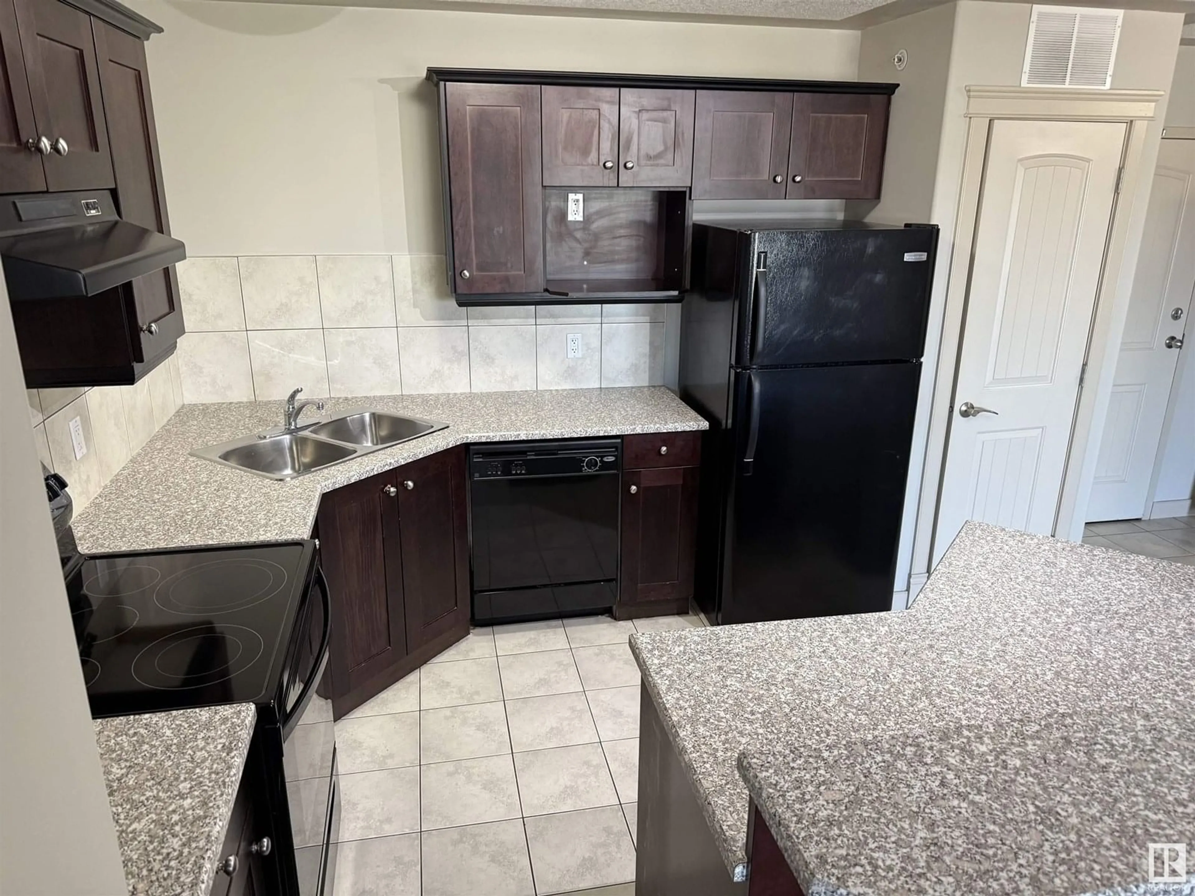 Standard kitchen, ceramic/tile floor for #402 - 4415 48 ST, Leduc Alberta T9E5Y3