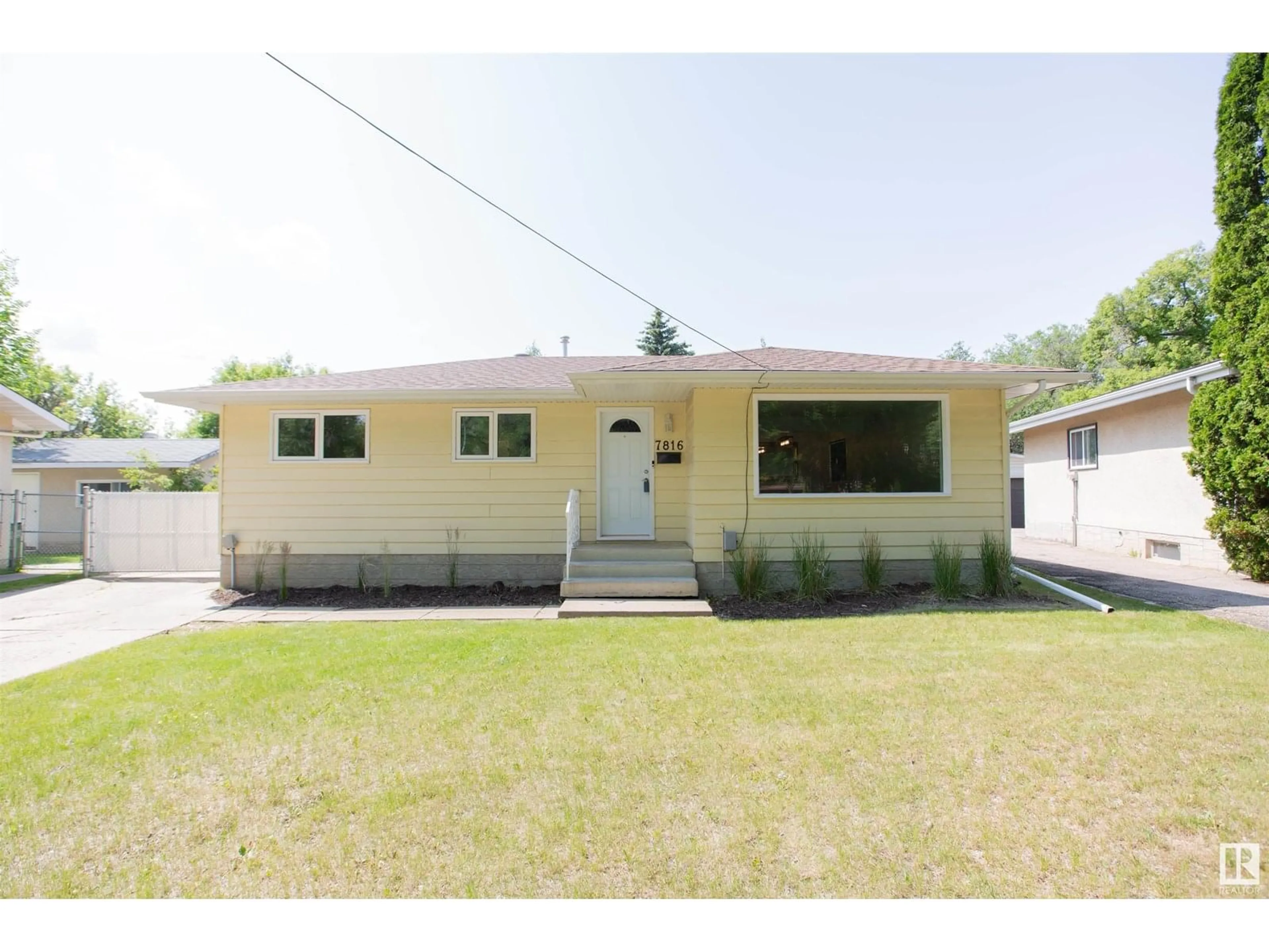 Home with vinyl exterior material, street for NW - 7816 158 ST, Edmonton Alberta T5R2B7
