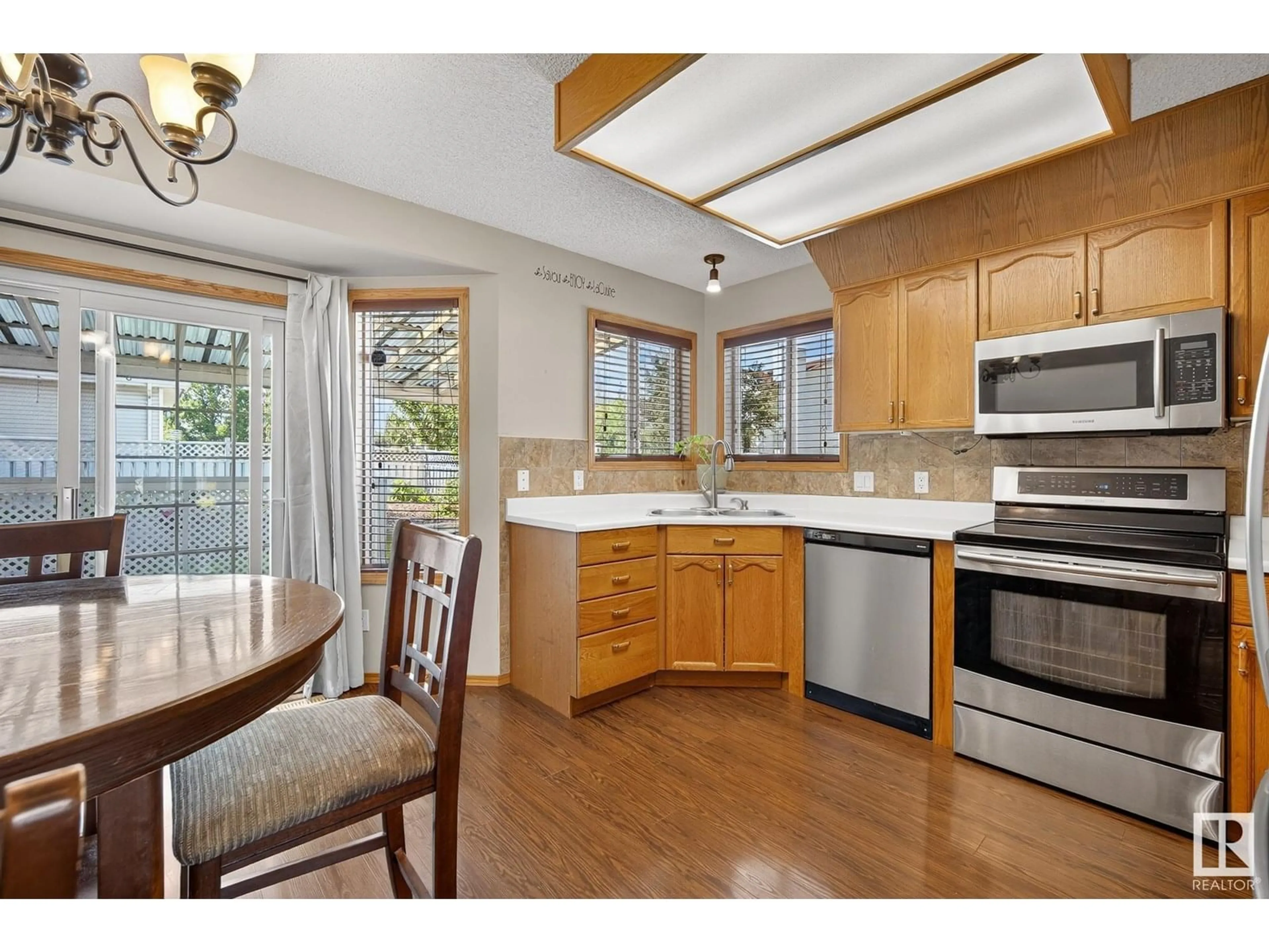 Open concept kitchen, unknown for 3627 40 AV, Edmonton Alberta T6L6M8