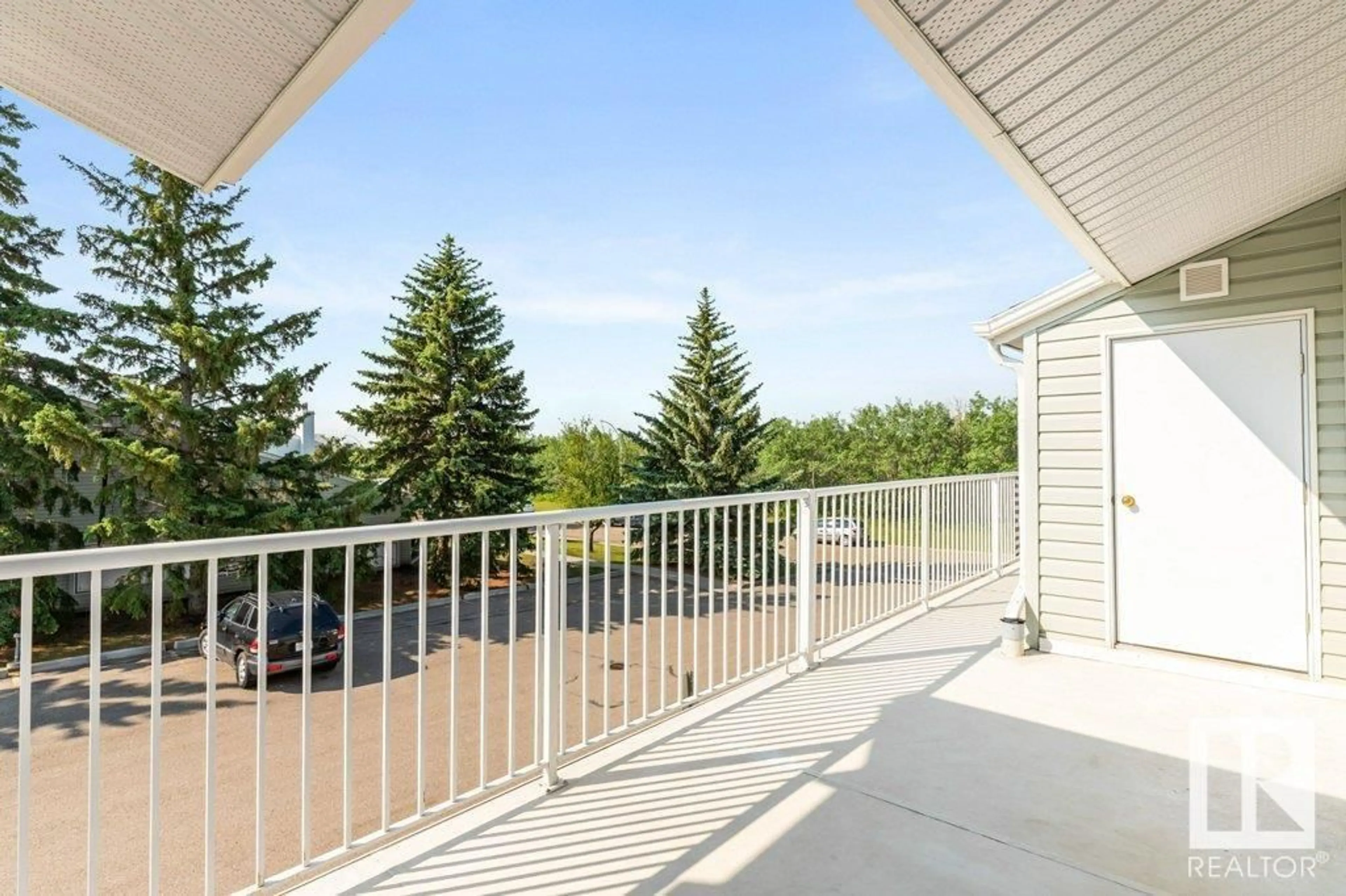 Patio, water/lake/river/ocean view for 19 - 2115 118 ST, Edmonton Alberta T6J5N1