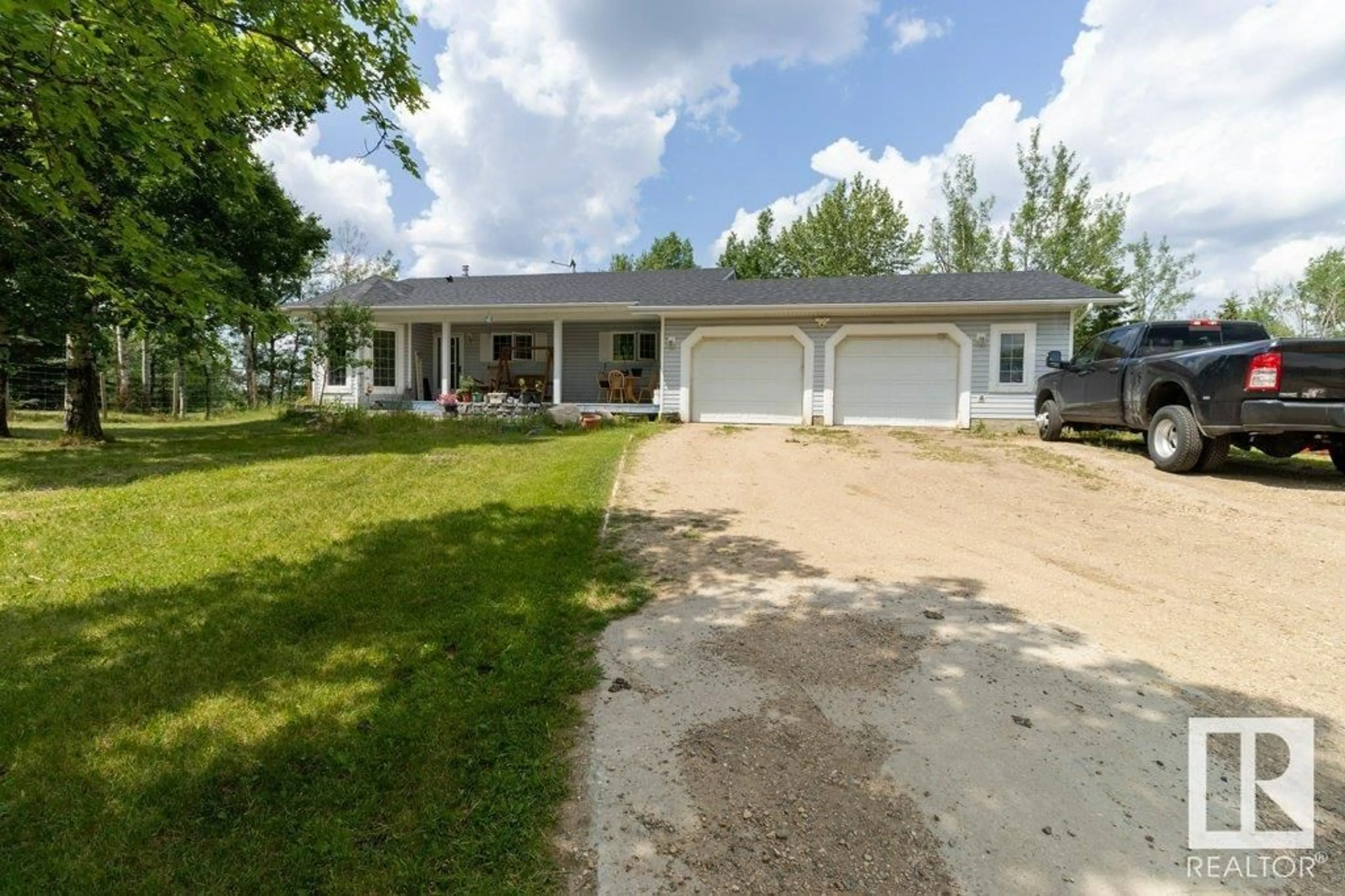 A pic from outside/outdoor area/front of a property/back of a property/a pic from drone, street for 51052 RGE ROAD 220, Rural Strathcona County Alberta T8E1G8