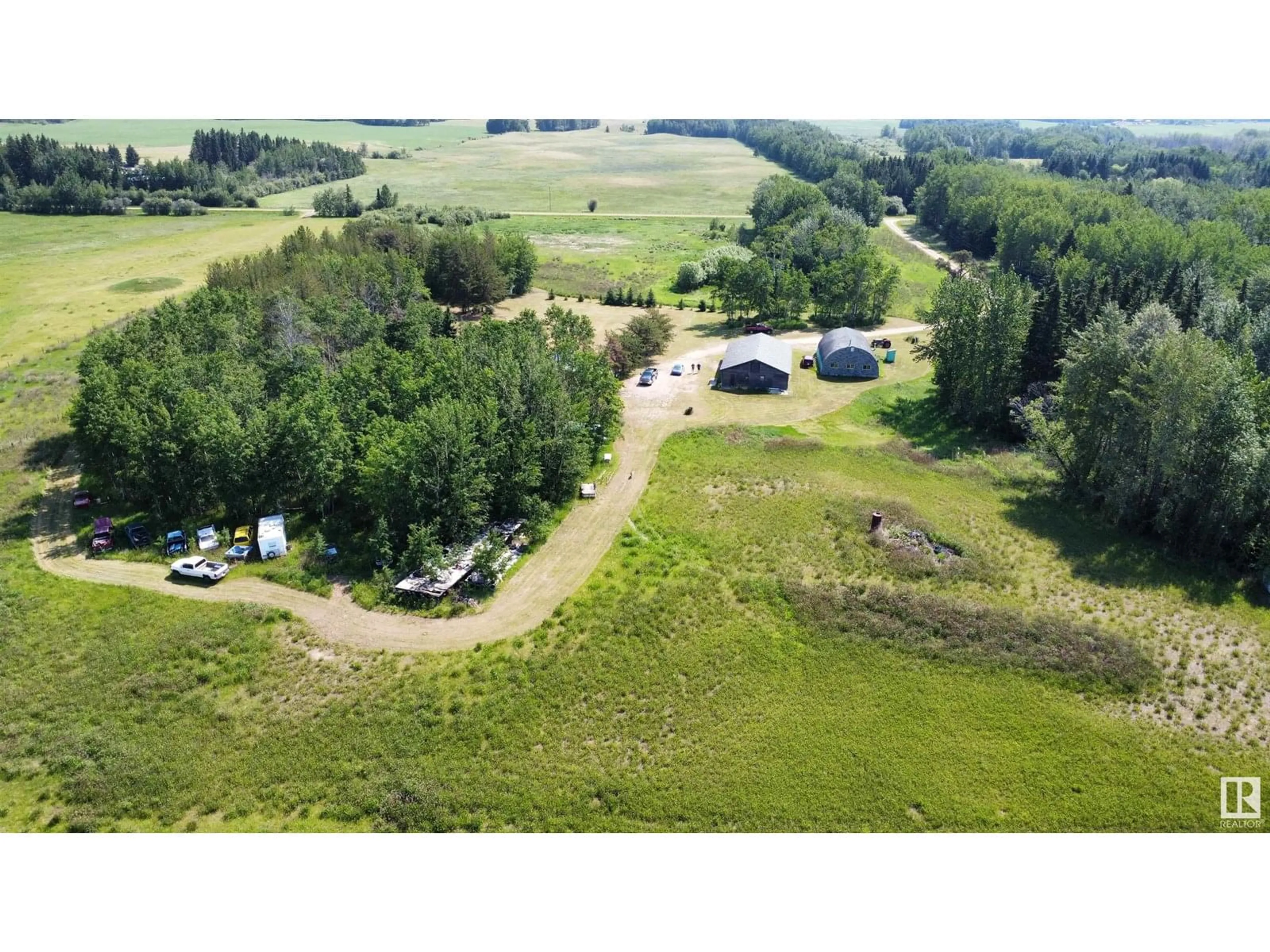 A pic from outside/outdoor area/front of a property/back of a property/a pic from drone, unknown for 63118 263, Rural Westlock County Alberta T0G0S0