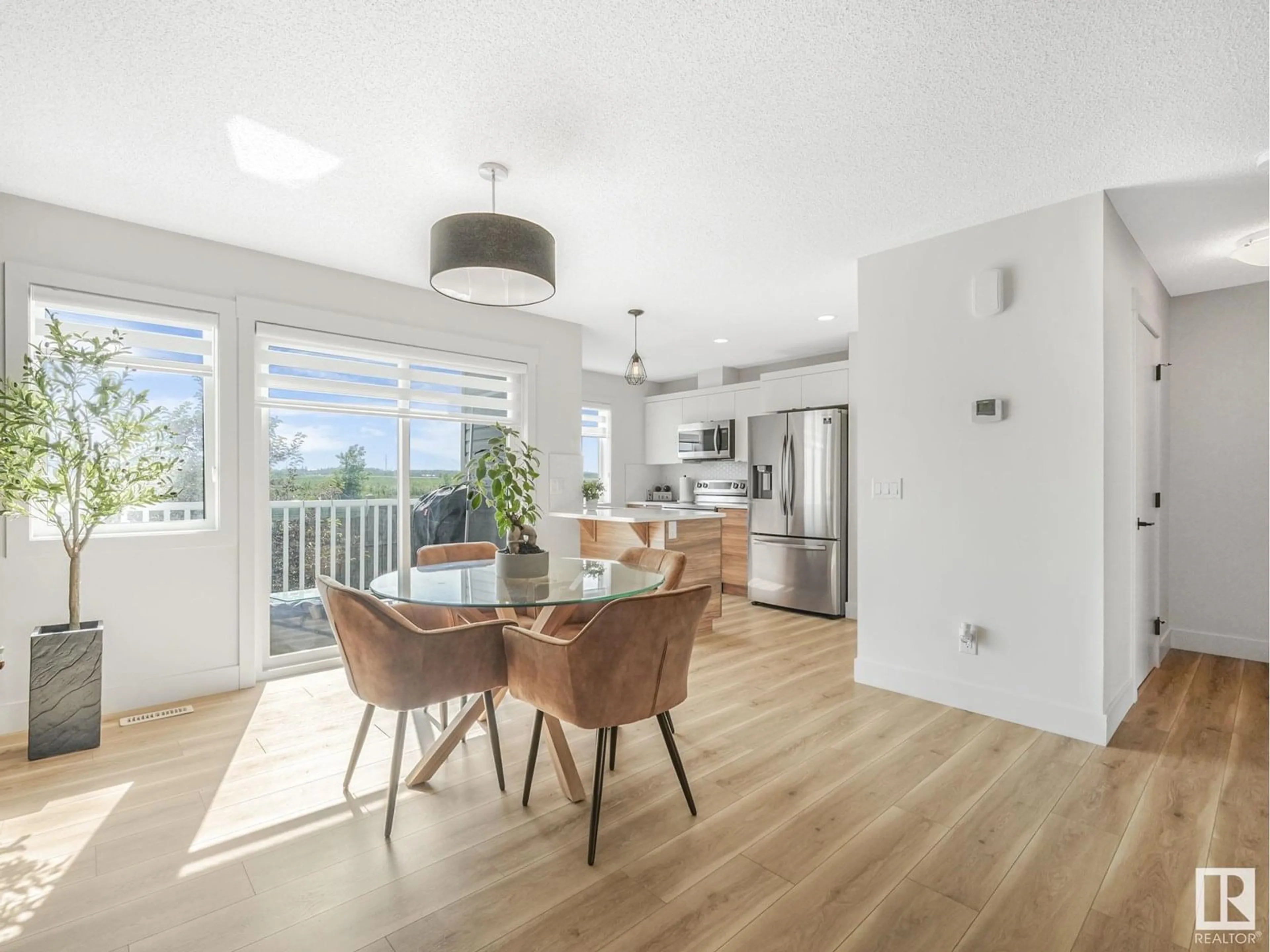 Open concept kitchen, wood/laminate floor for #40 - 1391 STARLING DR, Edmonton Alberta T5S0L3