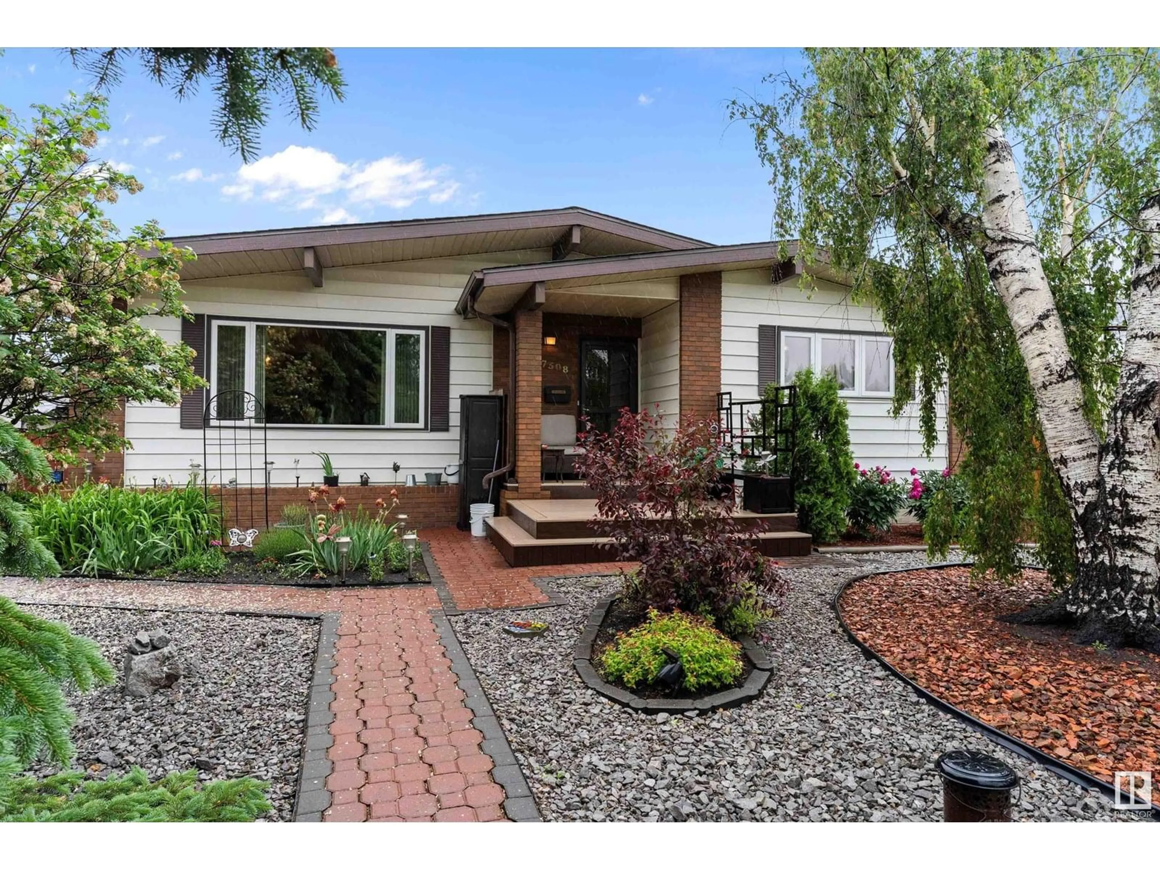 Home with brick exterior material, street for NW - 7508 152A AV, Edmonton Alberta T5C2Z7