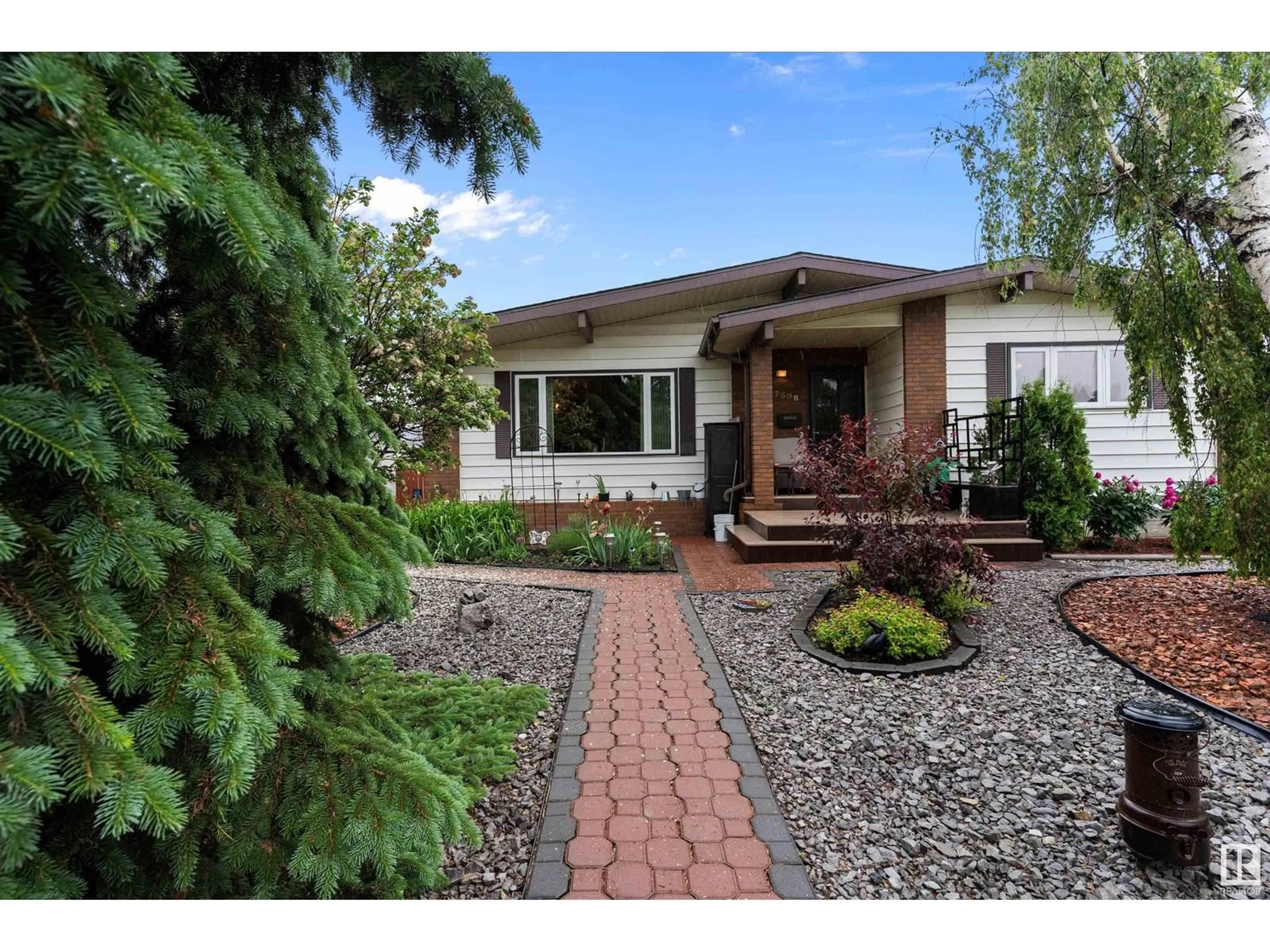 Home with vinyl exterior material, street for NW - 7508 152A AV, Edmonton Alberta T5C2Z7