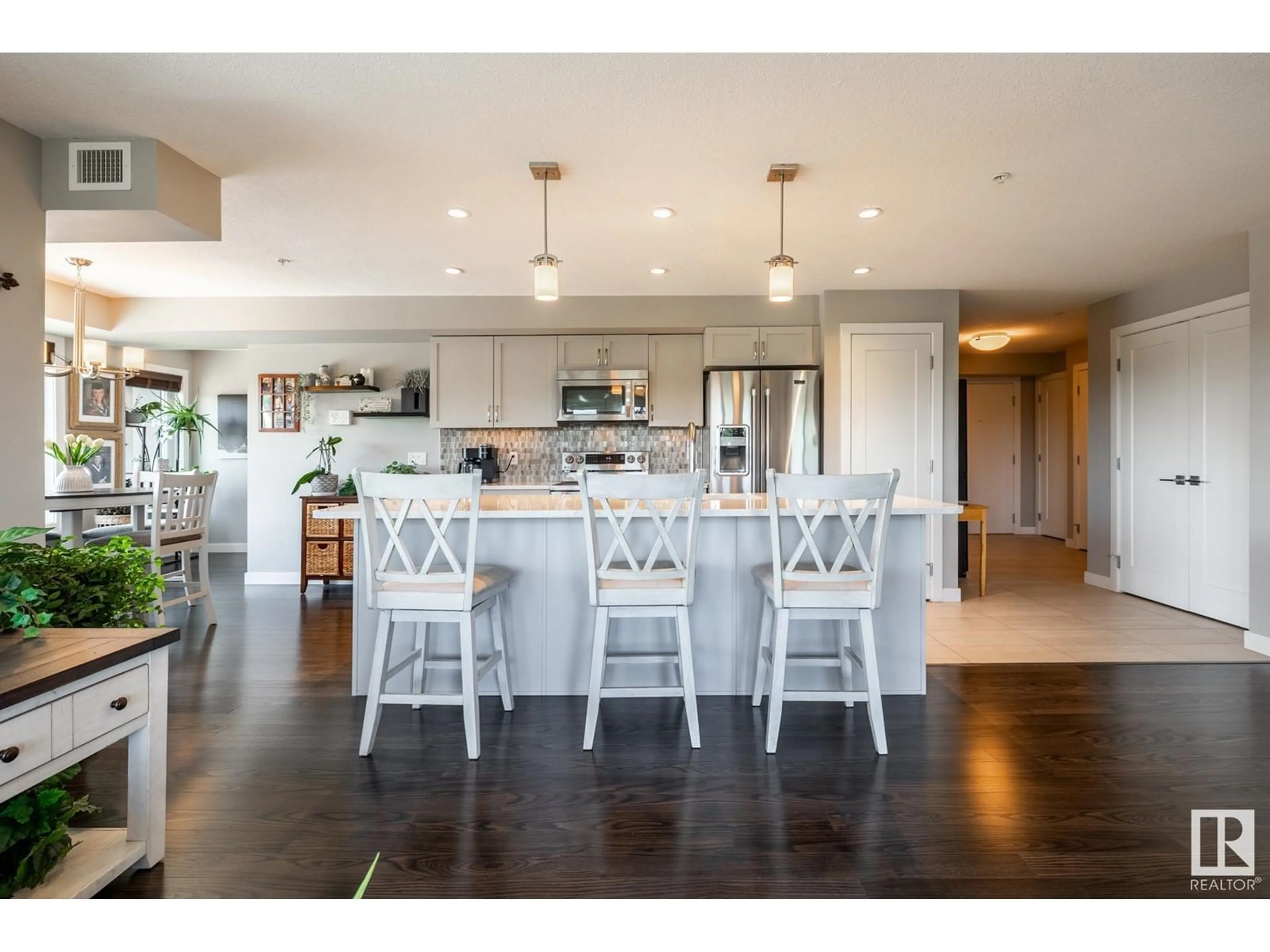 Open concept kitchen, wood/laminate floor for 5029 - 311 EDGEMONT BV, Edmonton Alberta T6M0S8