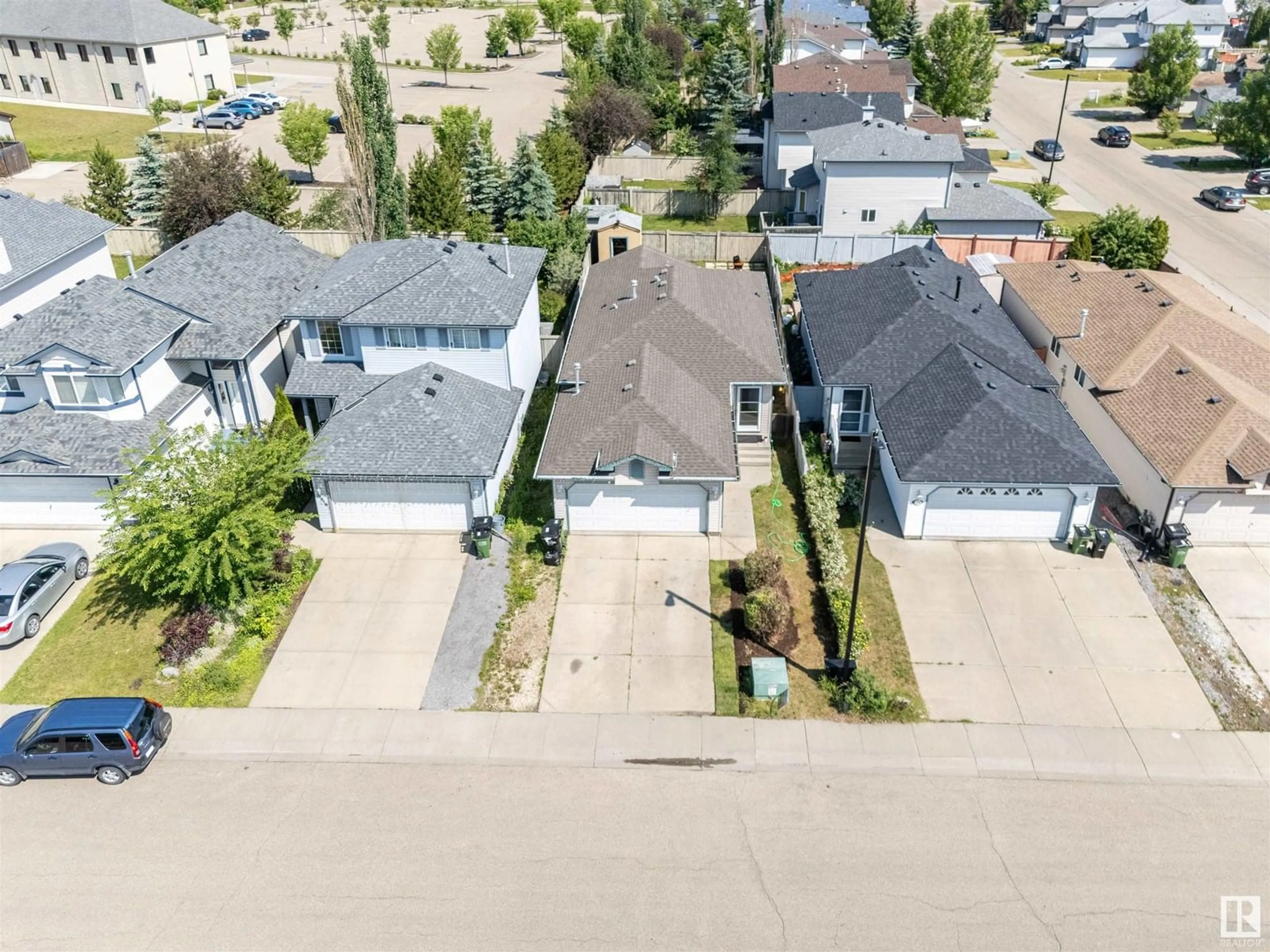 A pic from outside/outdoor area/front of a property/back of a property/a pic from drone, street for 3312 27 AVE, Edmonton Alberta T6T1P7