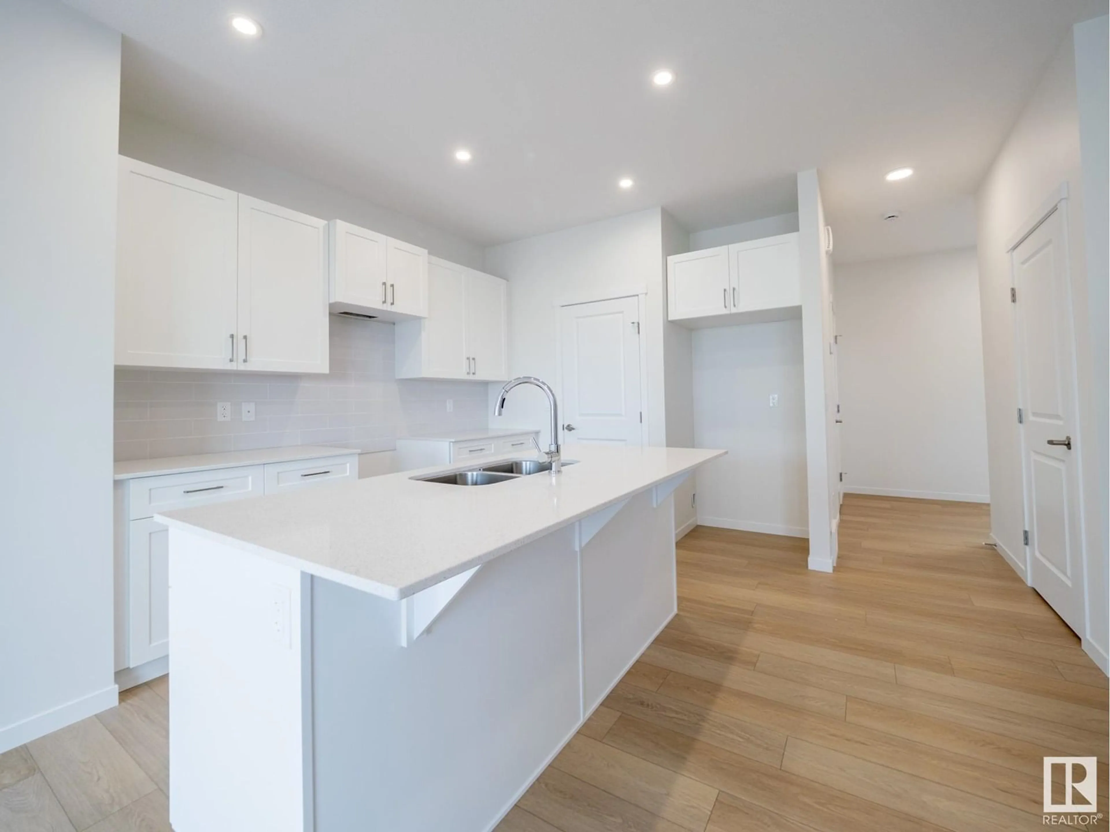 Open concept kitchen, unknown for NW - 2511 211 ST, Edmonton Alberta T6M3H1