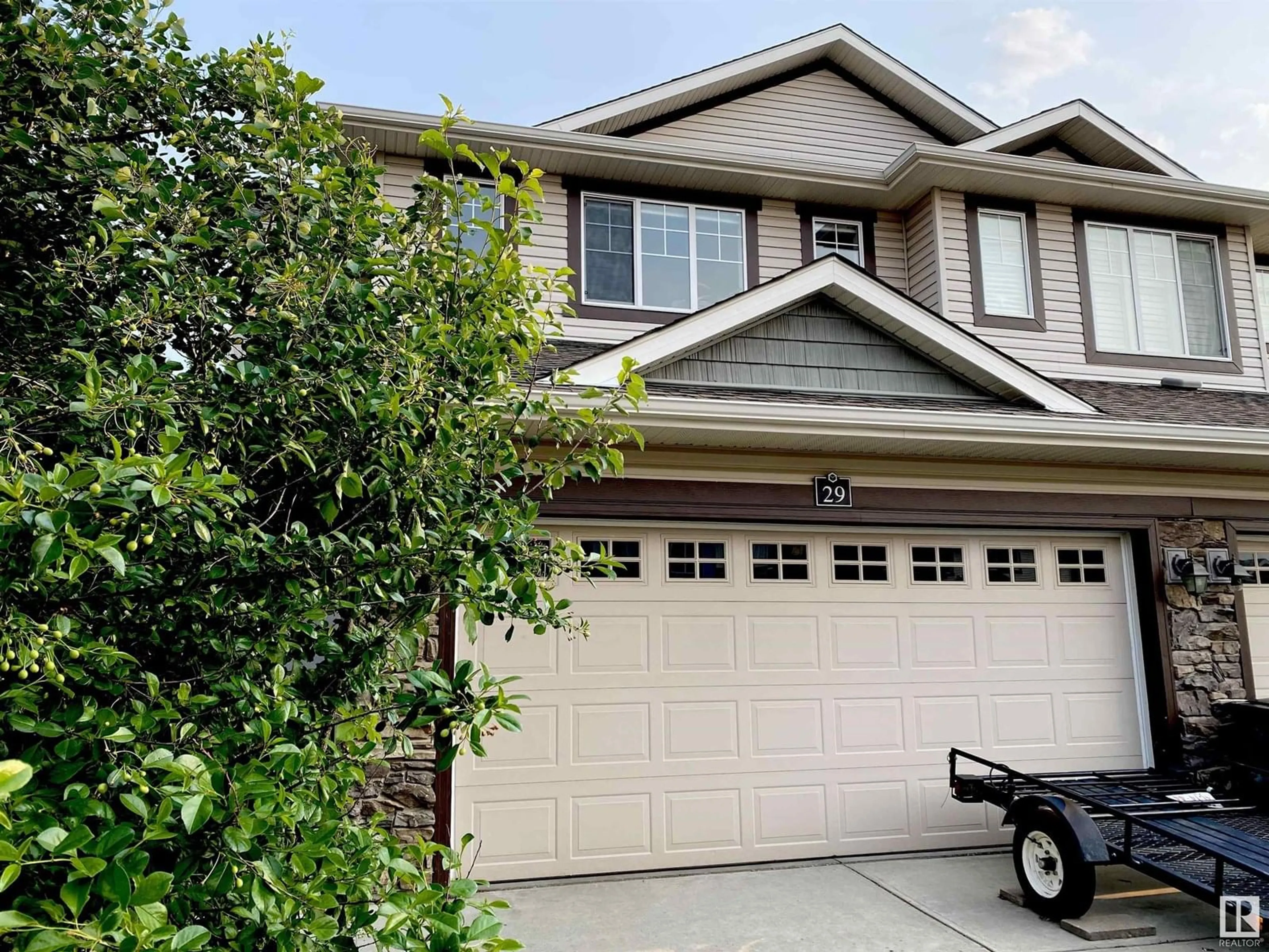 Home with vinyl exterior material, street for 29 SUNTERRA WY, Sherwood Park Alberta T8H0R3