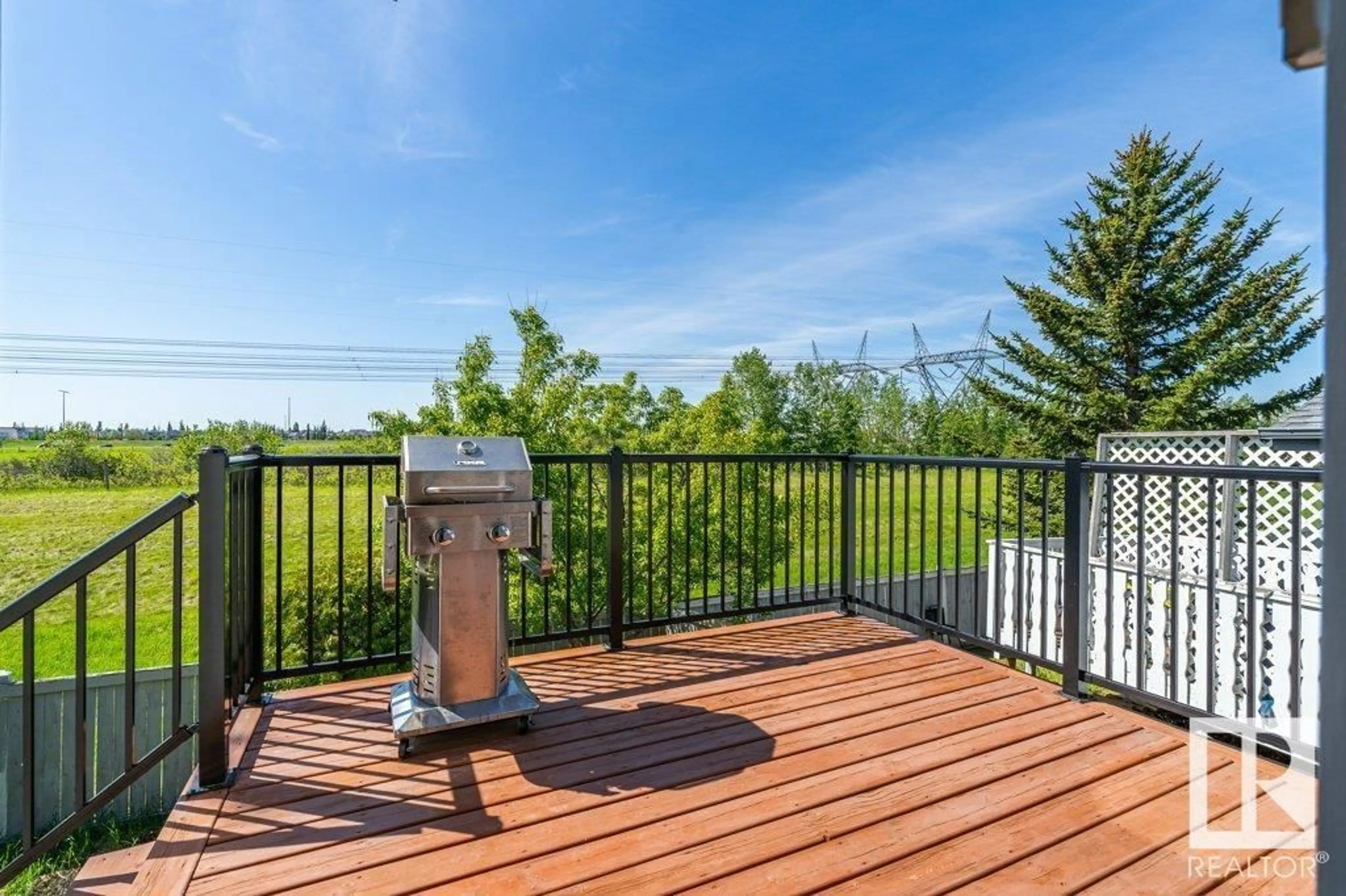 Patio, water/lake/river/ocean view for 11839 8 AV, Edmonton Alberta T6J6Z9