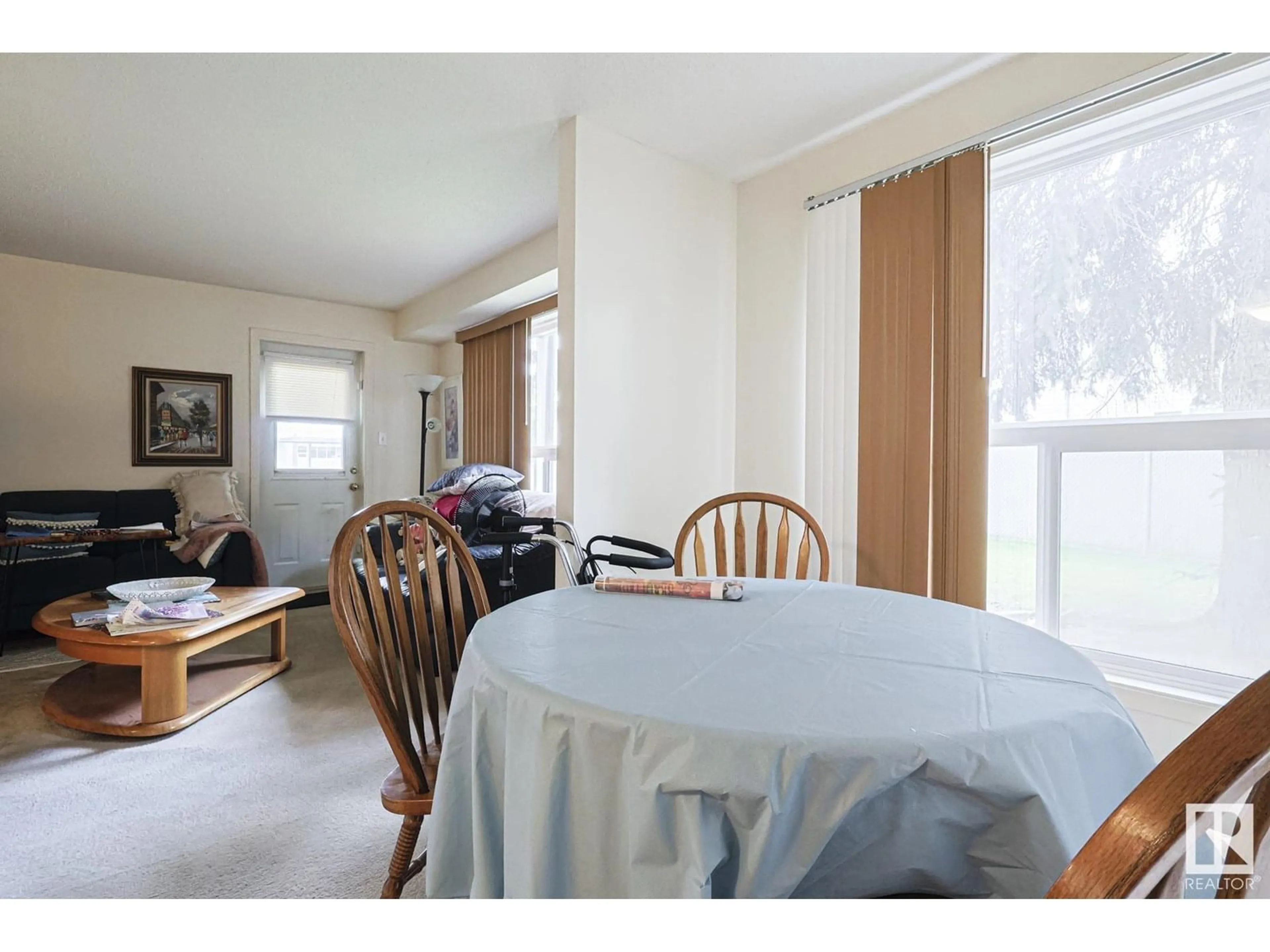 Dining room, wood/laminate floor for 40 - 109 ALPINE PL, St. Albert Alberta T8N3Y2