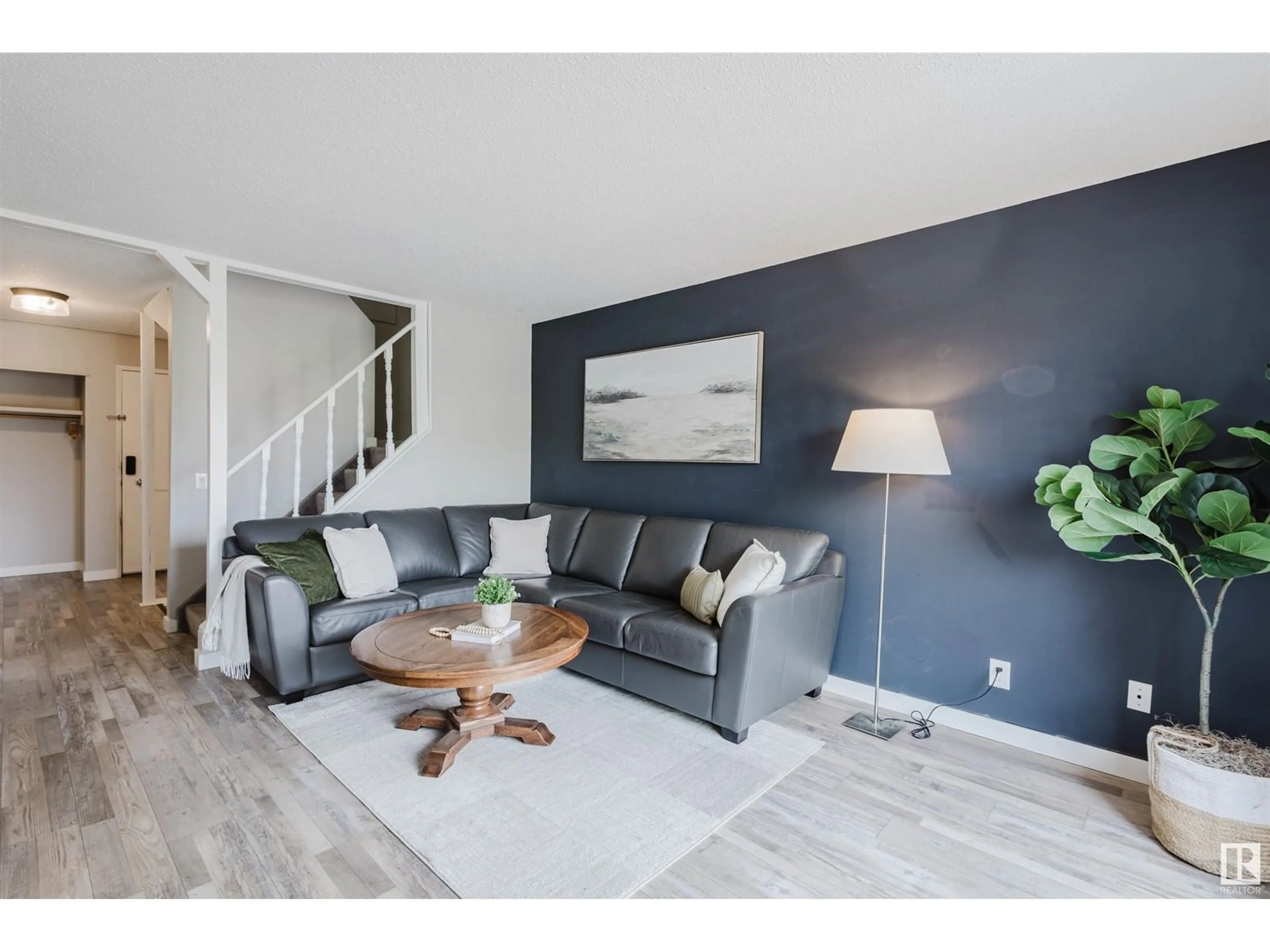 Living room with furniture, wood/laminate floor for 71 GRANDIN VG, St. Albert Alberta T8N1R9