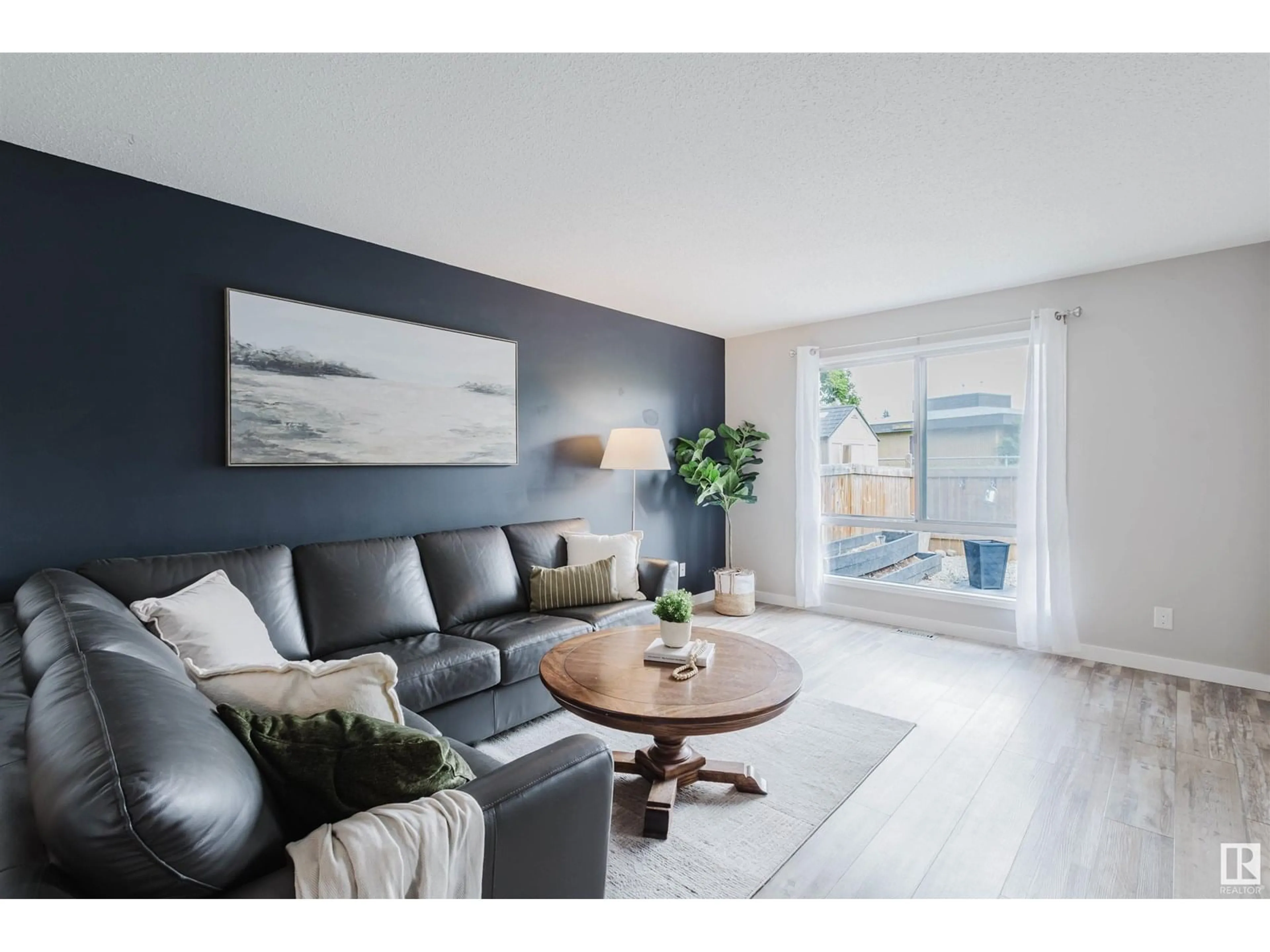 Living room with furniture, wood/laminate floor for 71 GRANDIN VG, St. Albert Alberta T8N1R9