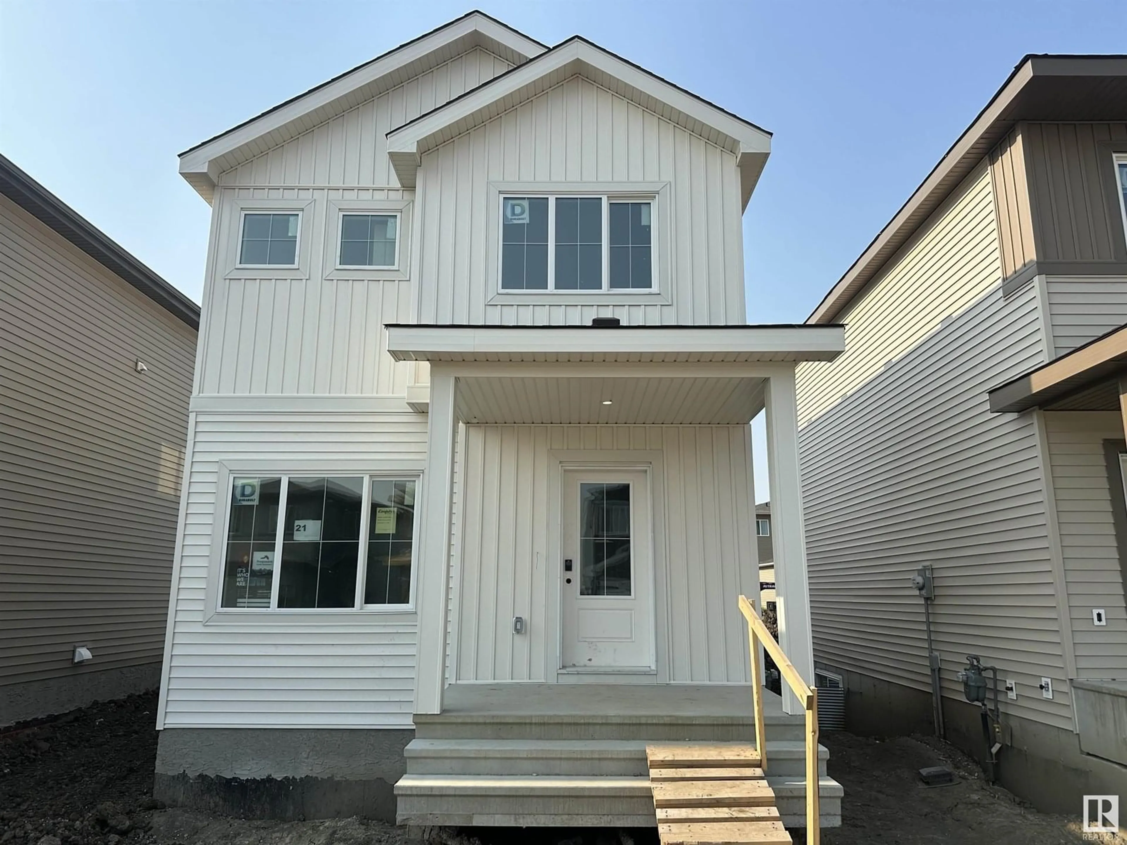 Home with vinyl exterior material, street for 21 ETON LI, Spruce Grove Alberta T7X4B7
