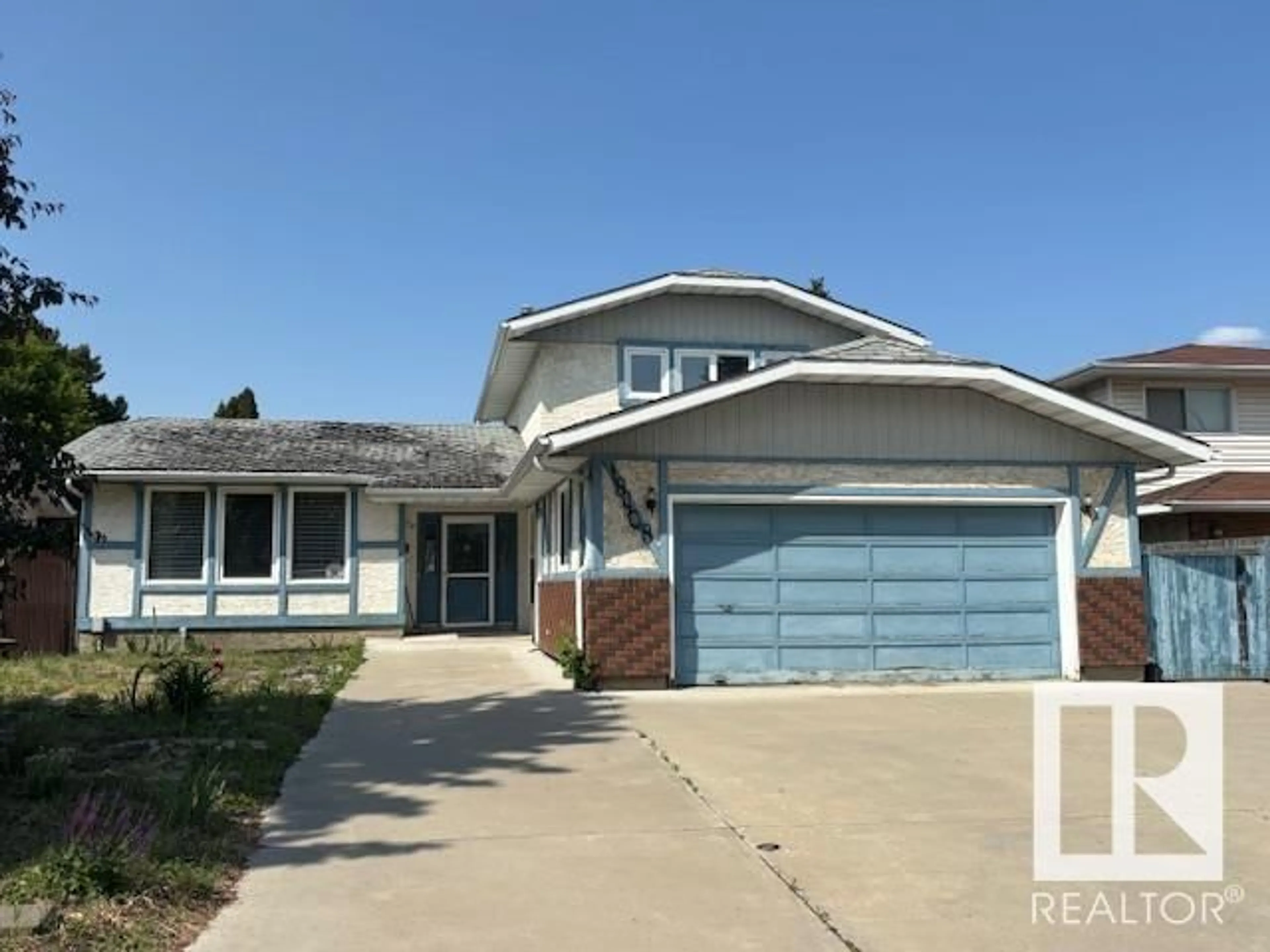 Home with vinyl exterior material, street for 18408 81 AV, Edmonton Alberta T5T1G1