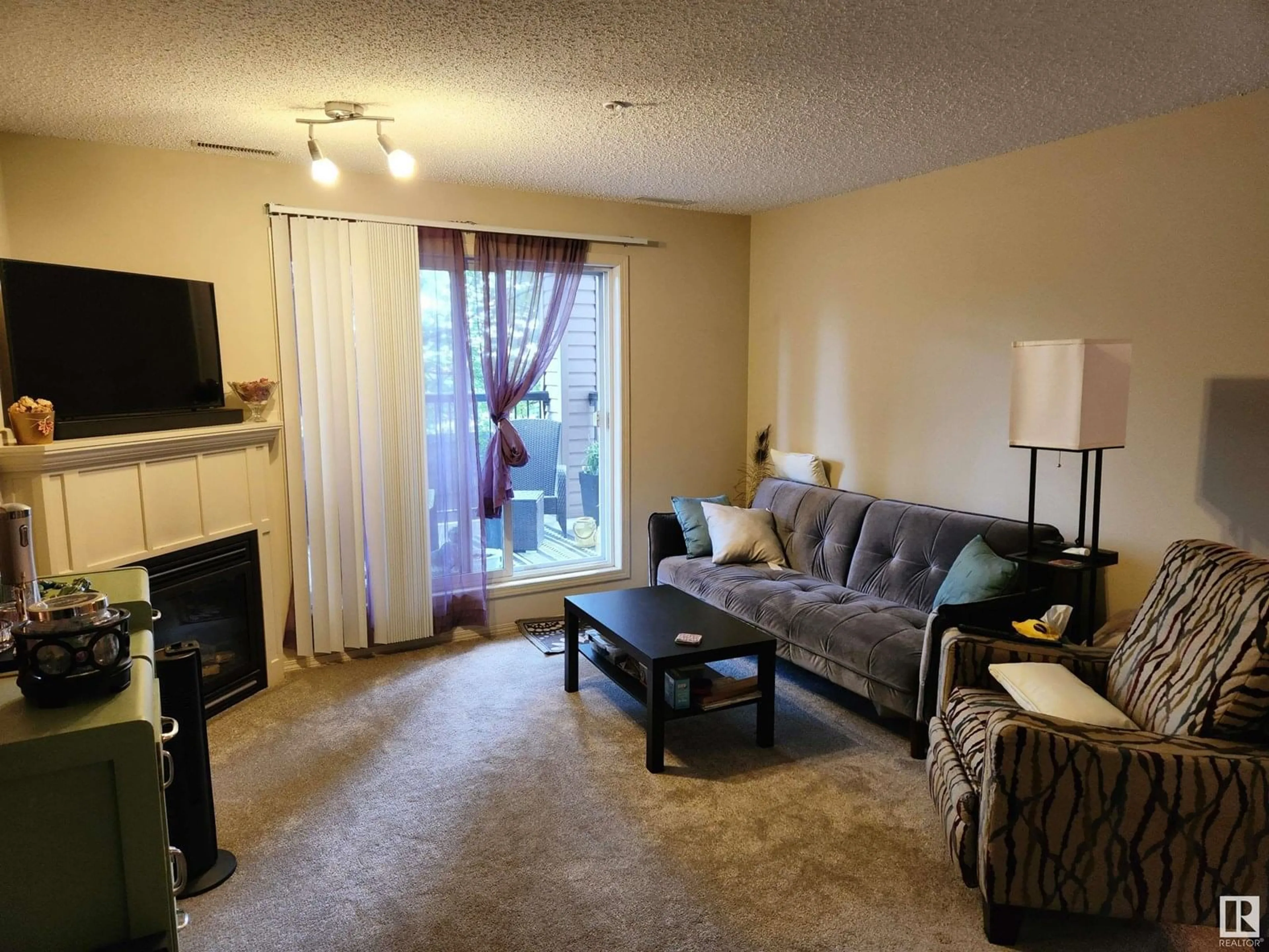 Living room with furniture, unknown for #123 - 2098 BLACKMUD CREEK DR, Edmonton Alberta T6W1T7