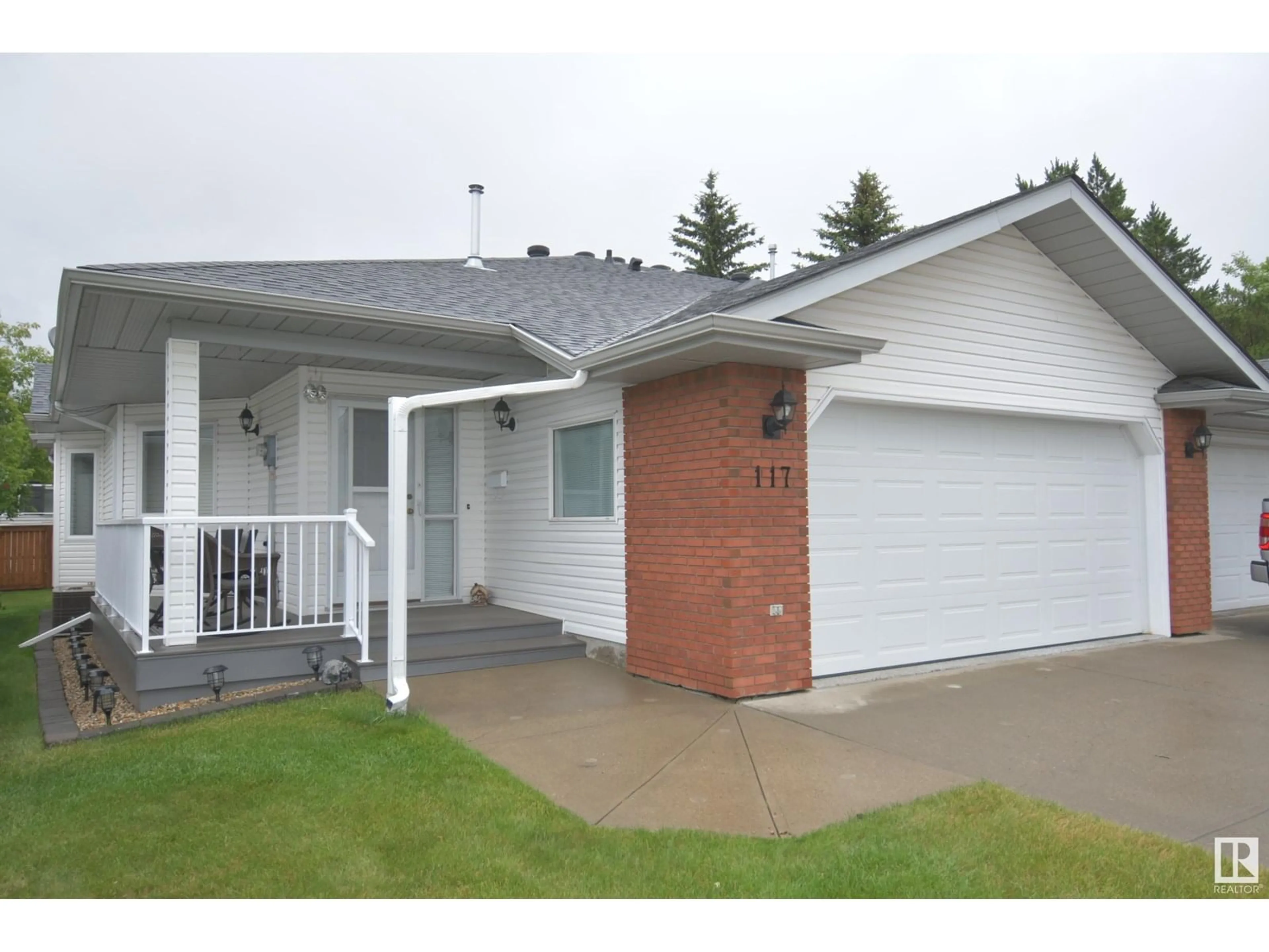 Home with vinyl exterior material, street for 117 LAKESIDE PL, Leduc Alberta T9E6P7