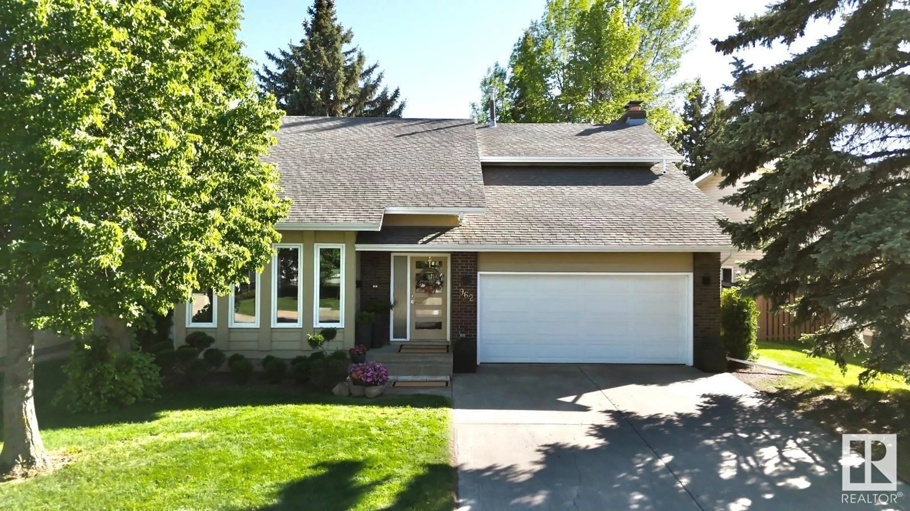 Home with vinyl exterior material, street for 962 RICE RD, Edmonton Alberta T6R1A1