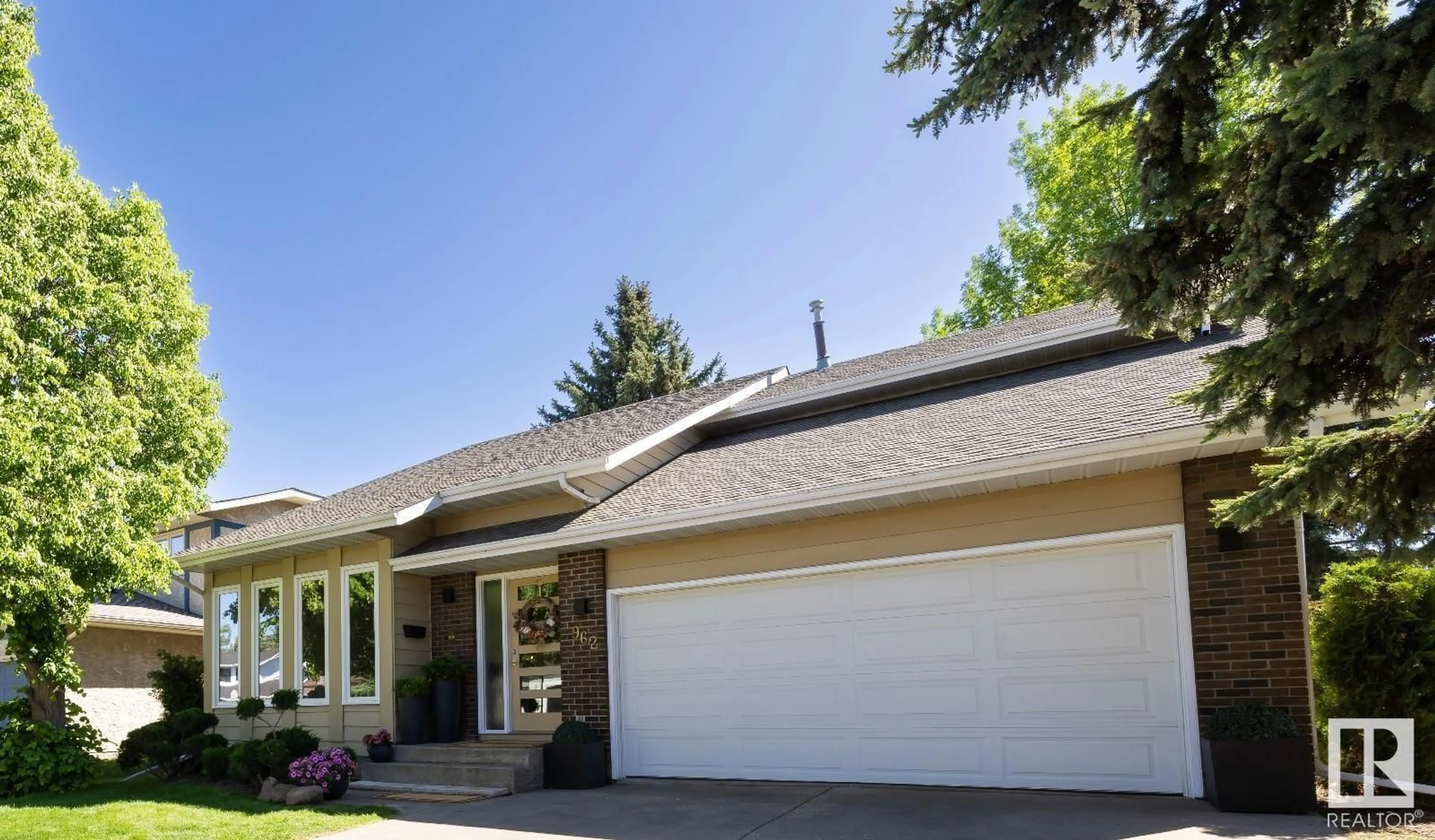 Home with vinyl exterior material, street for 962 RICE RD, Edmonton Alberta T6R1A1