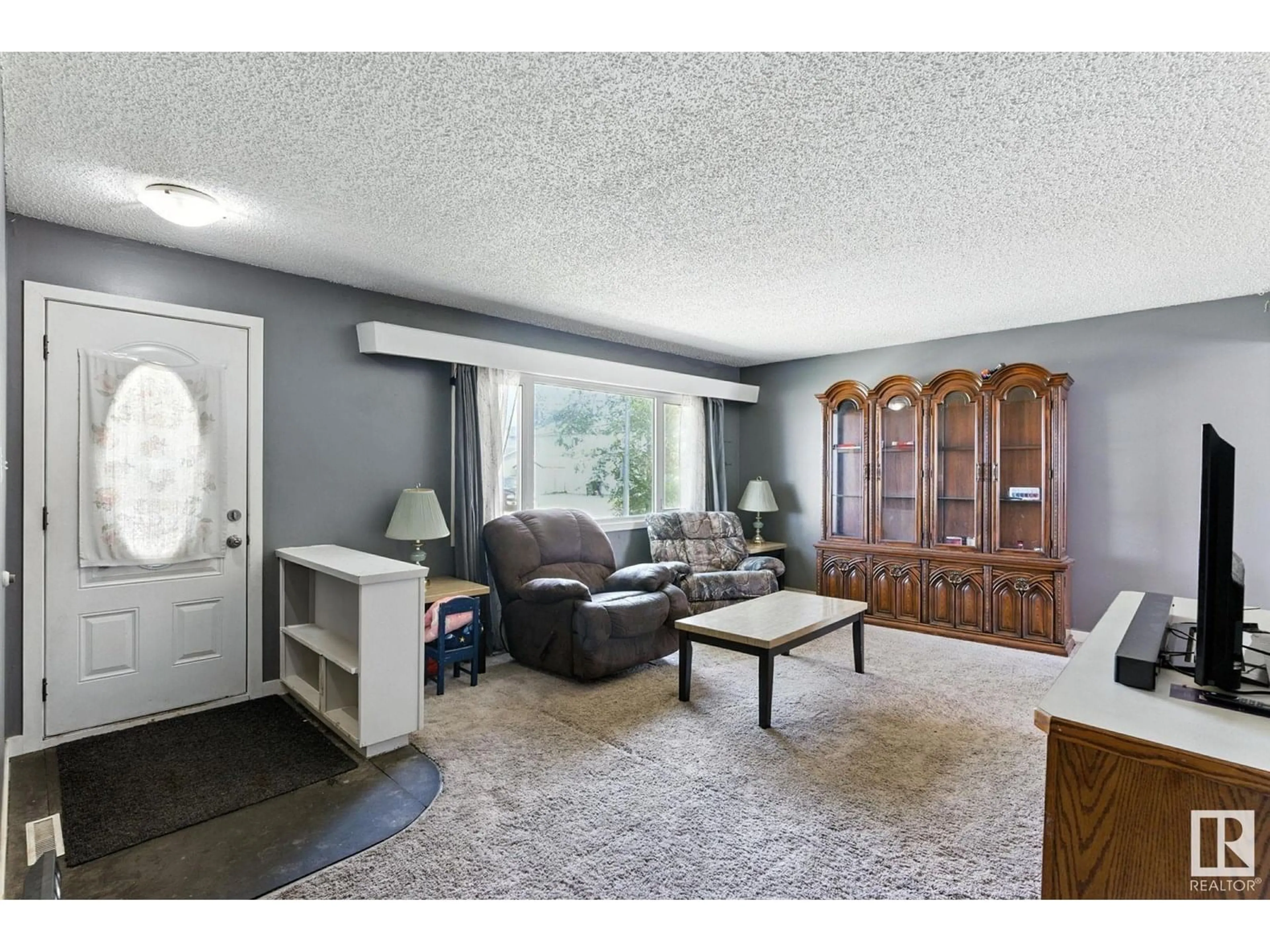 Living room with furniture, unknown for 12807 129 AV NW, Edmonton Alberta T5L3J7
