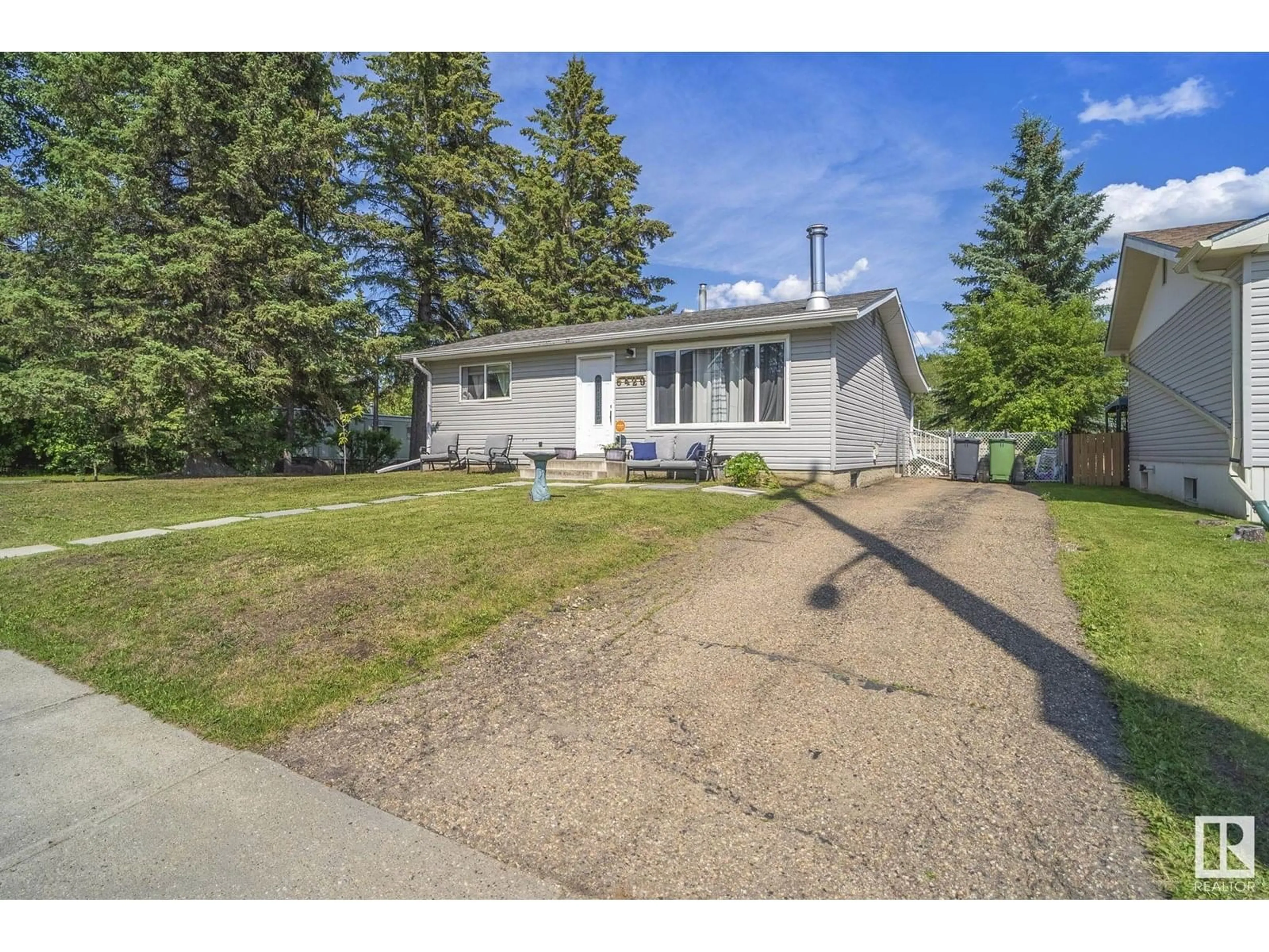 A pic from outside/outdoor area/front of a property/back of a property/a pic from drone, street for 5429 50 ST, Wabamun Alberta T0E2K0