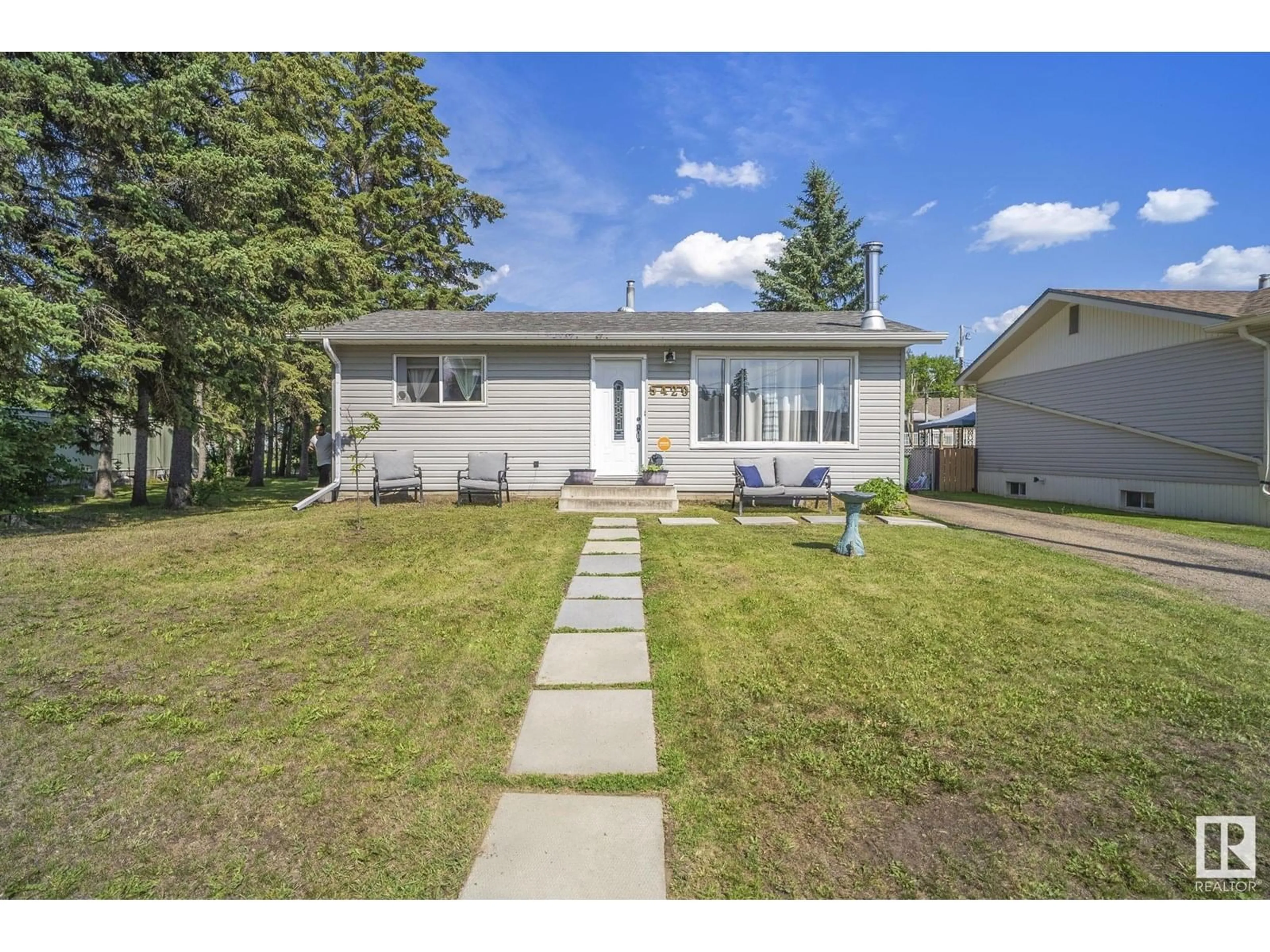 Home with vinyl exterior material, street for 5429 50 ST, Wabamun Alberta T0E2K0