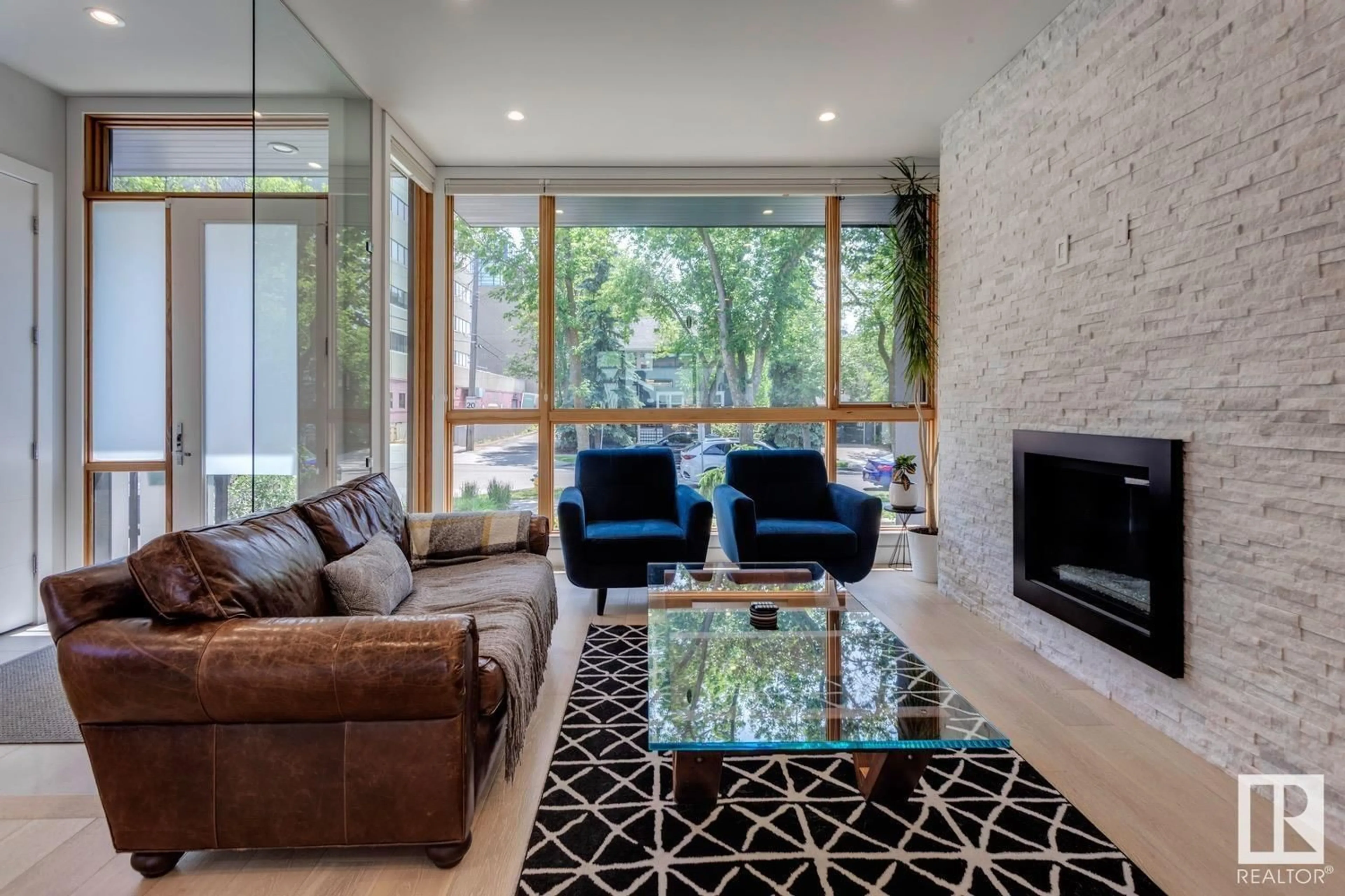 Living room with furniture, unknown for 12420 103 AV, Edmonton Alberta T5N0R3
