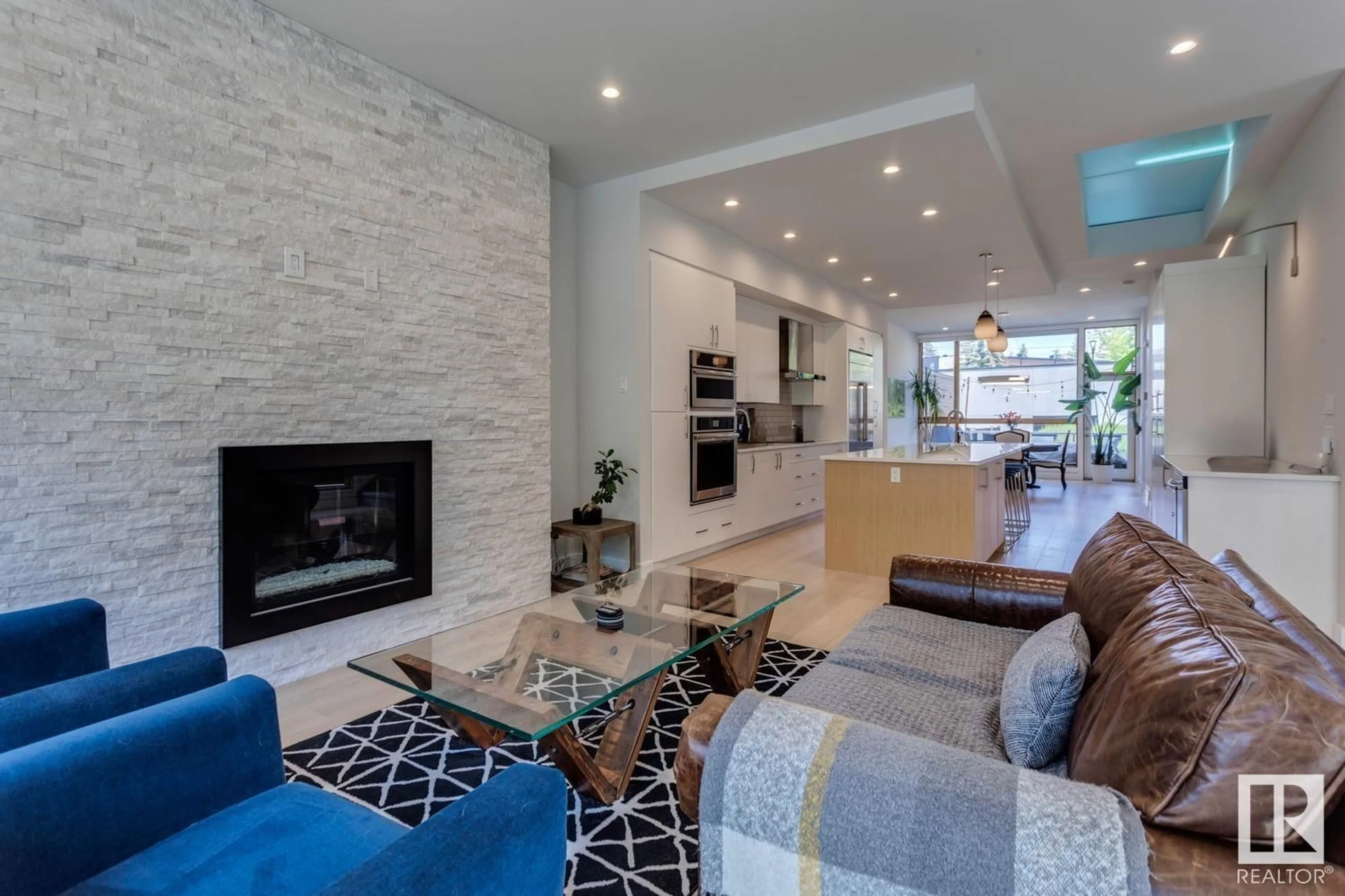 Living room with furniture, ceramic/tile floor for 12420 103 AV, Edmonton Alberta T5N0R3