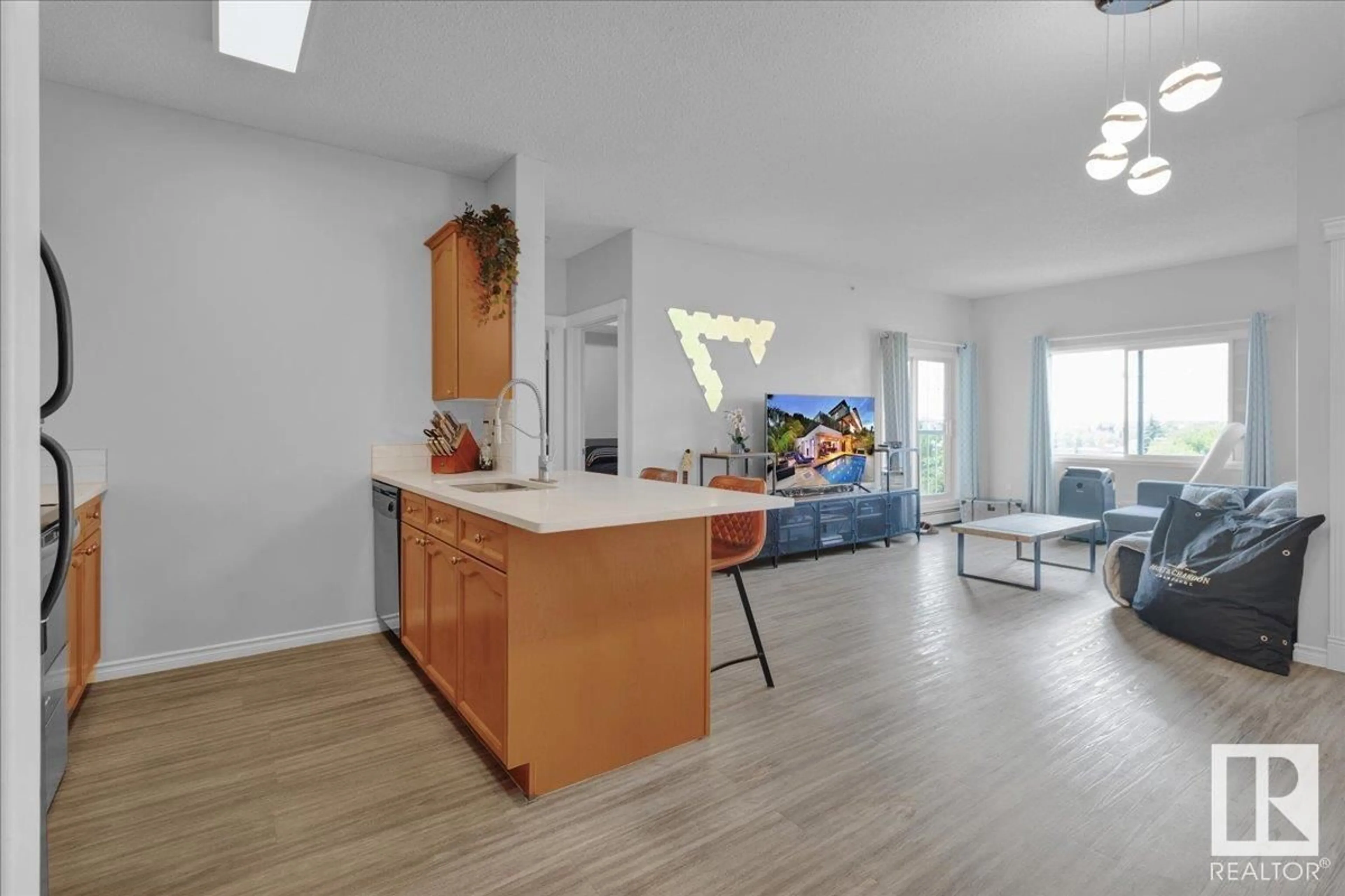 Open concept kitchen, unknown for NW - 429 16807 100 AV, Edmonton Alberta T5P4Z6