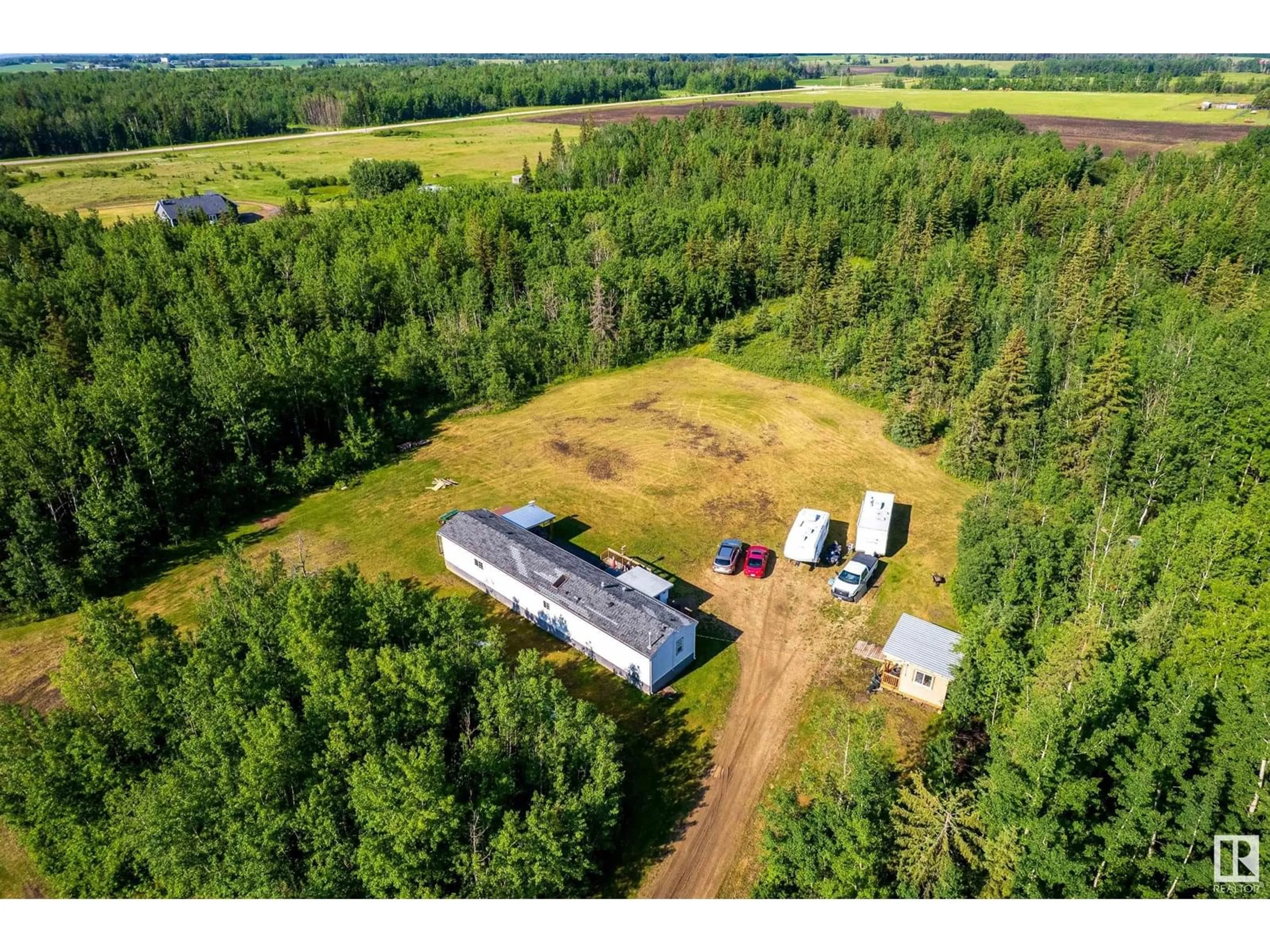 A pic from outside/outdoor area/front of a property/back of a property/a pic from drone, building for 56008 RGE ROAD 20A, Rural Lac Ste. Anne County Alberta T0E1V0