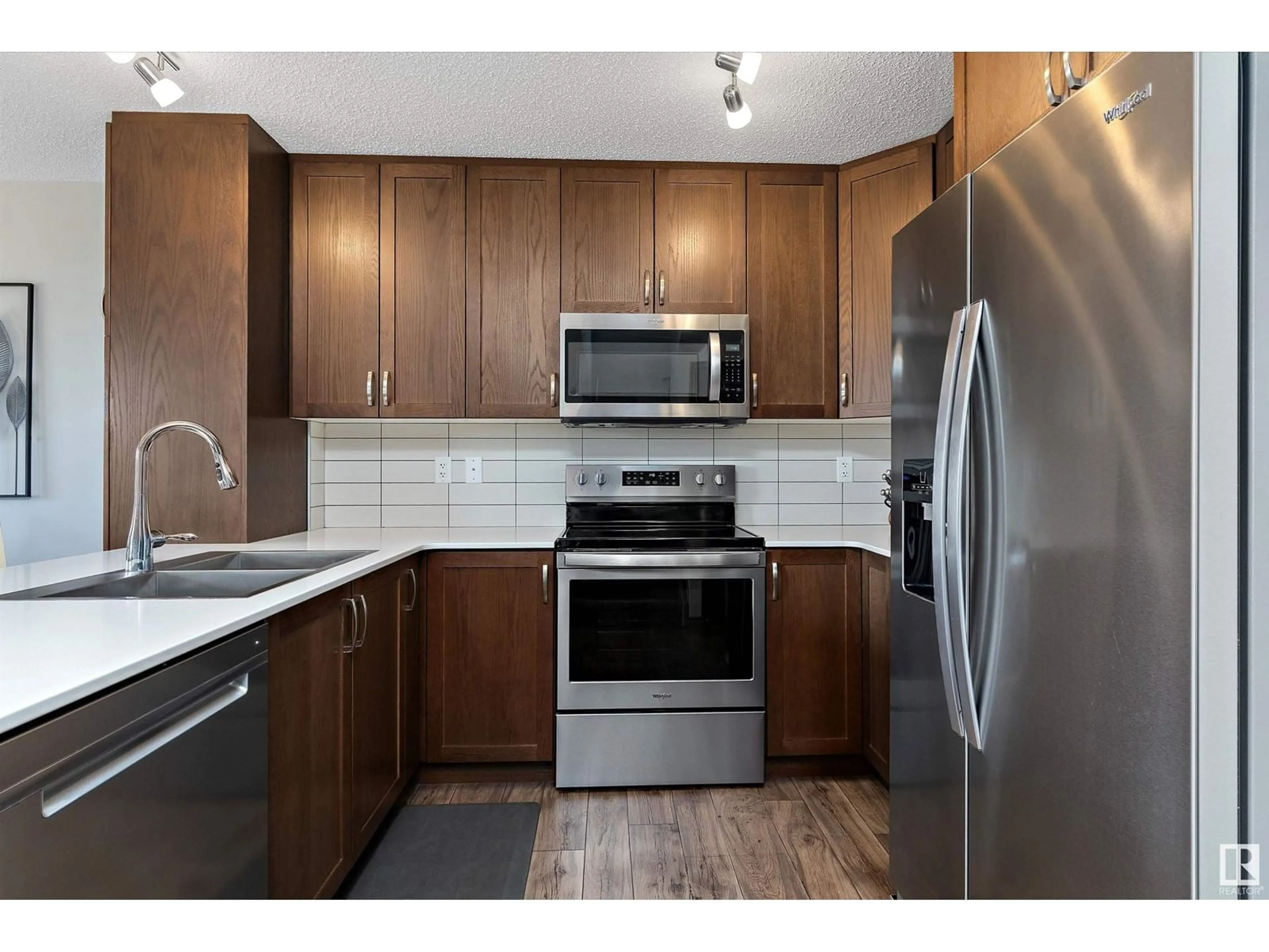 Standard kitchen, wood/laminate floor for 507 EBBERS WY, Edmonton Alberta T5Y3T8