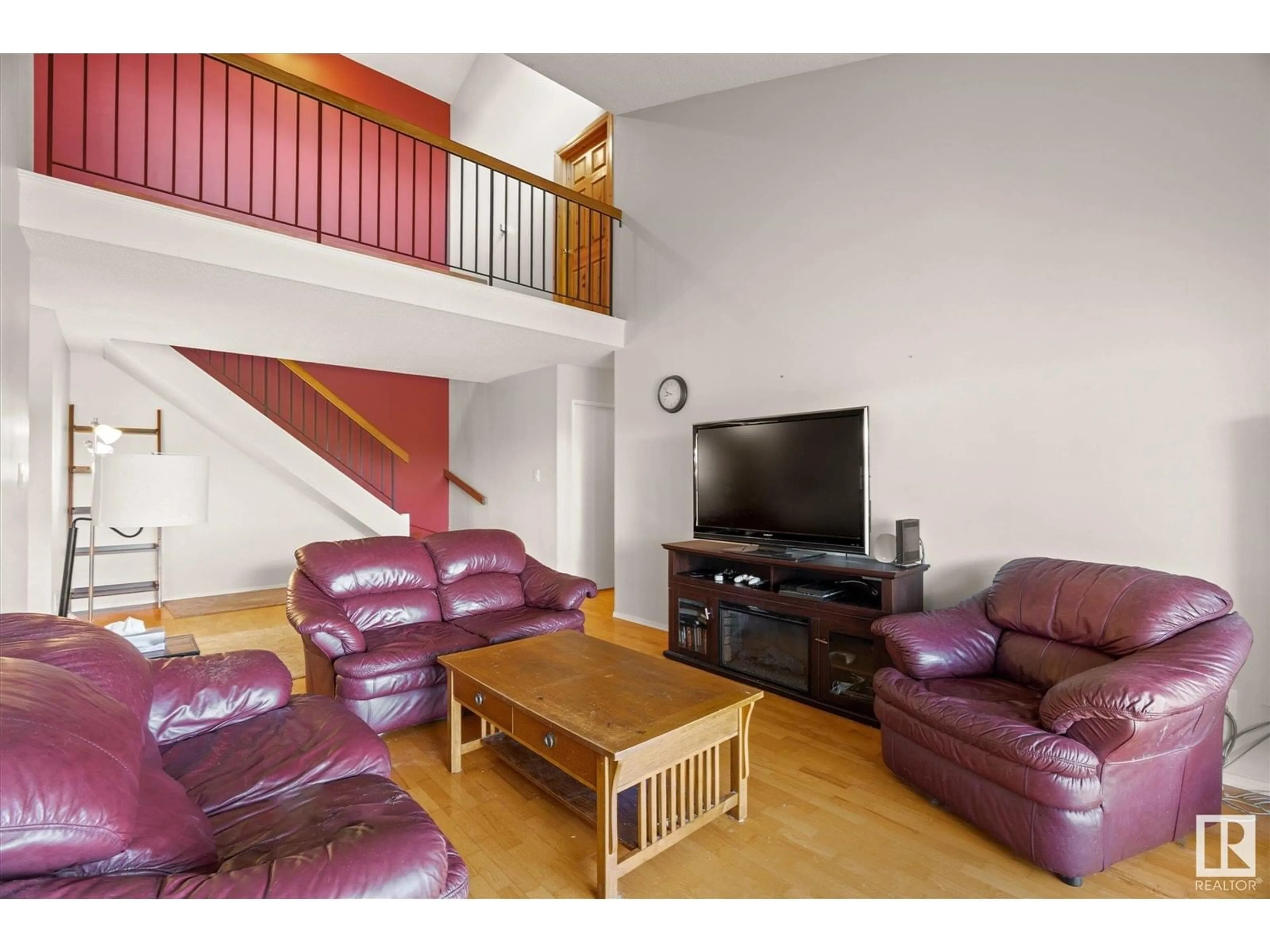 Living room with furniture, wood/laminate floor for #408 - 4404 122 ST, Edmonton Alberta T6J4A9