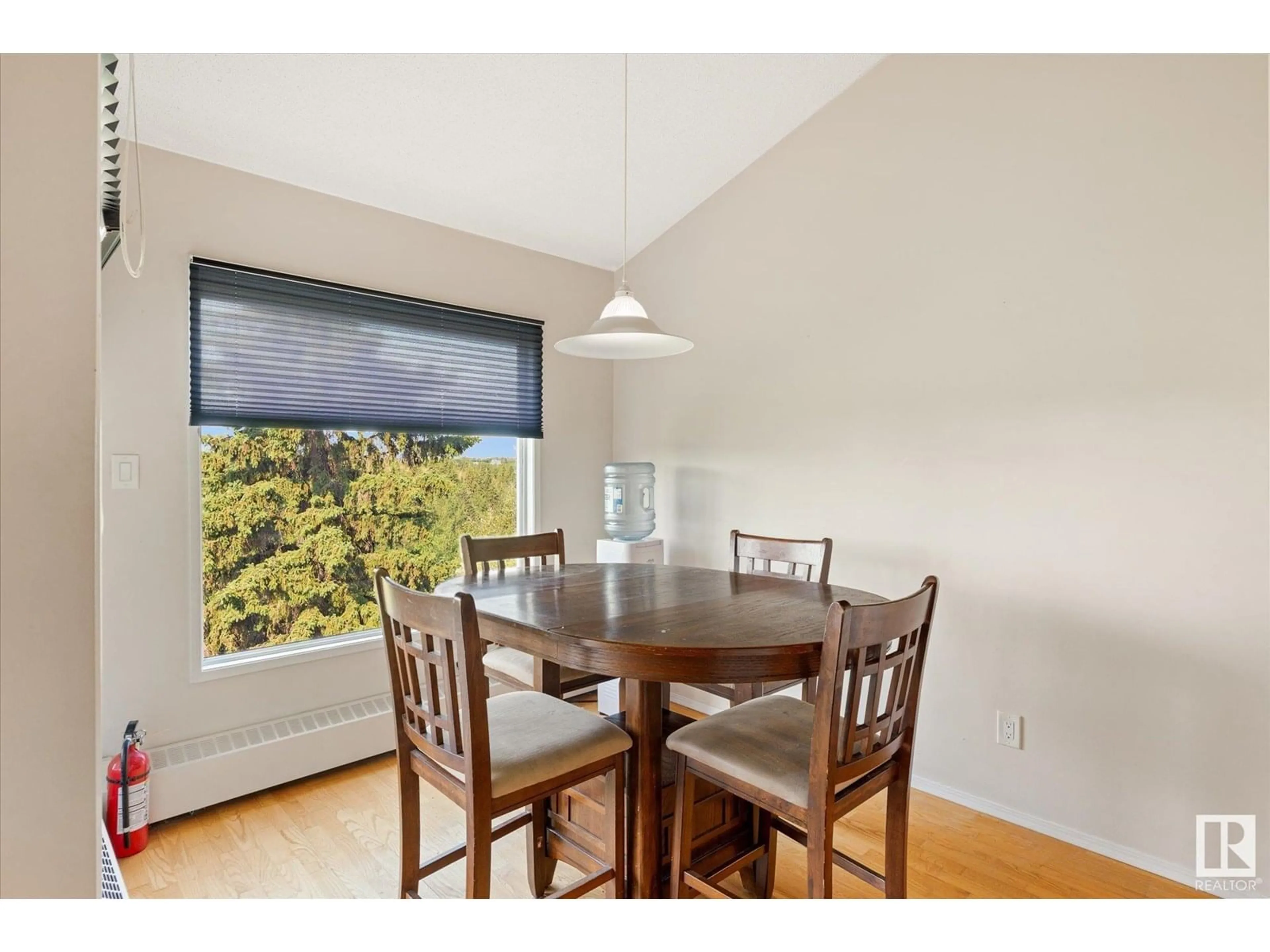Dining room, wood/laminate floor for #408 - 4404 122 ST, Edmonton Alberta T6J4A9