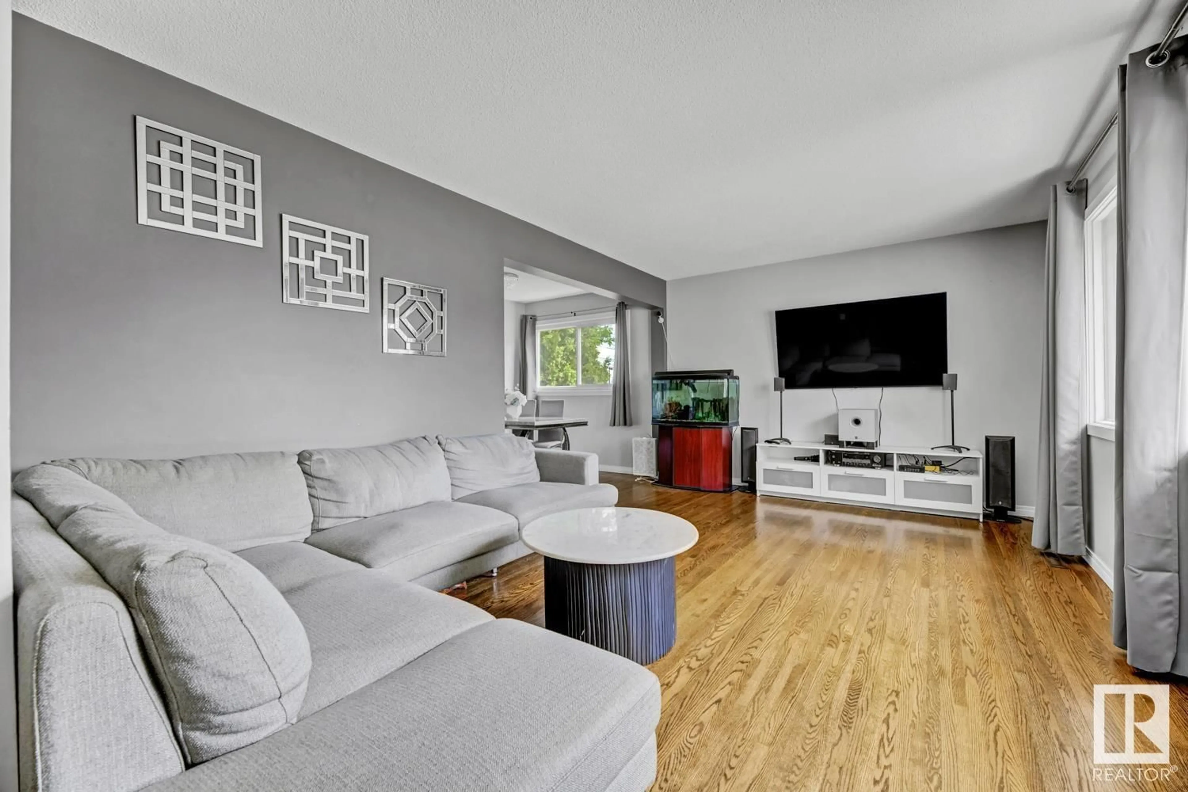 Living room with furniture, unknown for 8516 134A AV, Edmonton Alberta T5E1L7