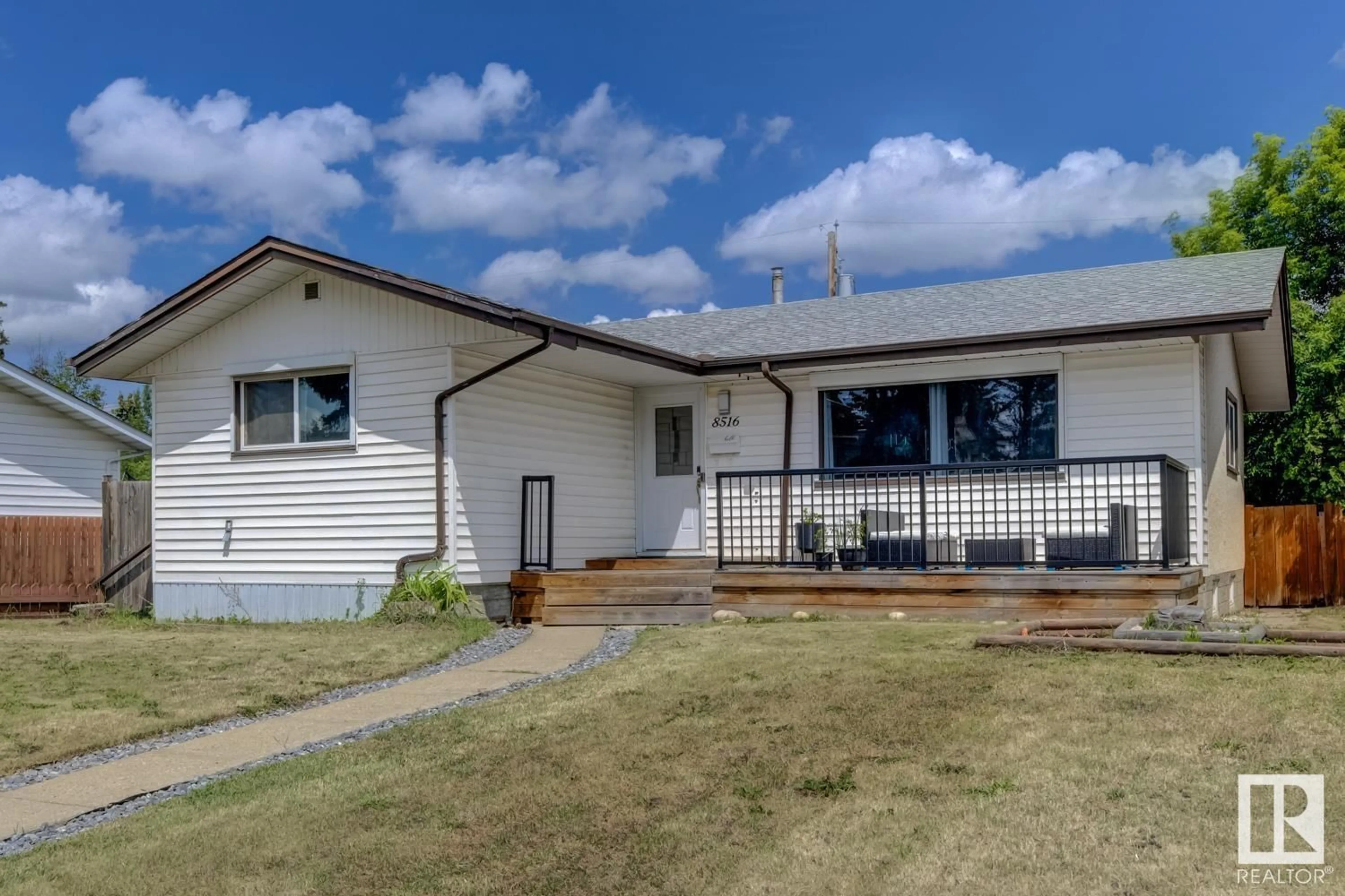 A pic from outside/outdoor area/front of a property/back of a property/a pic from drone, street for 8516 134A AV, Edmonton Alberta T5E1L7