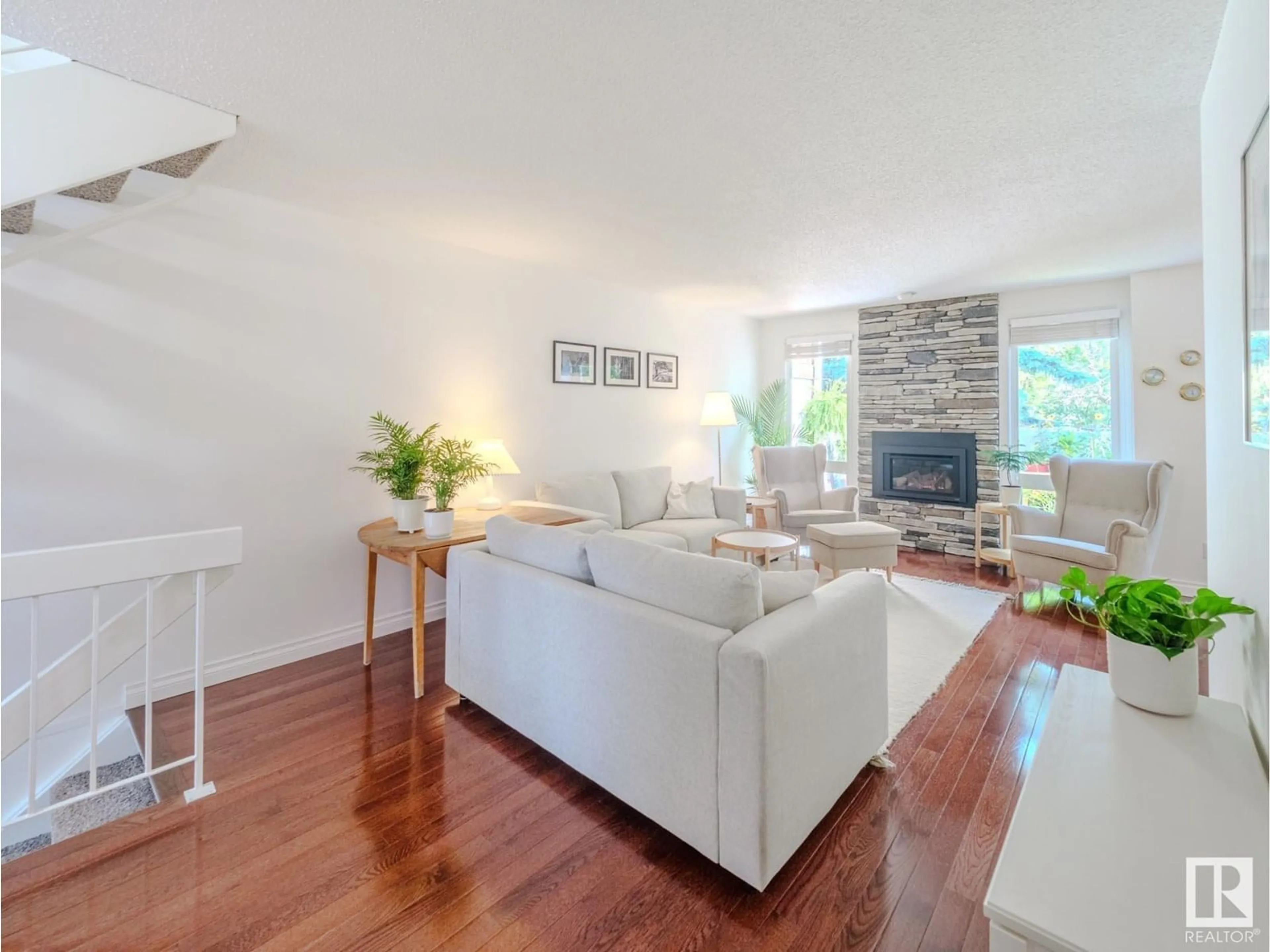 Living room with furniture, wood/laminate floor for 64 HEARTHSTONE NW, Edmonton Alberta T6H5E5
