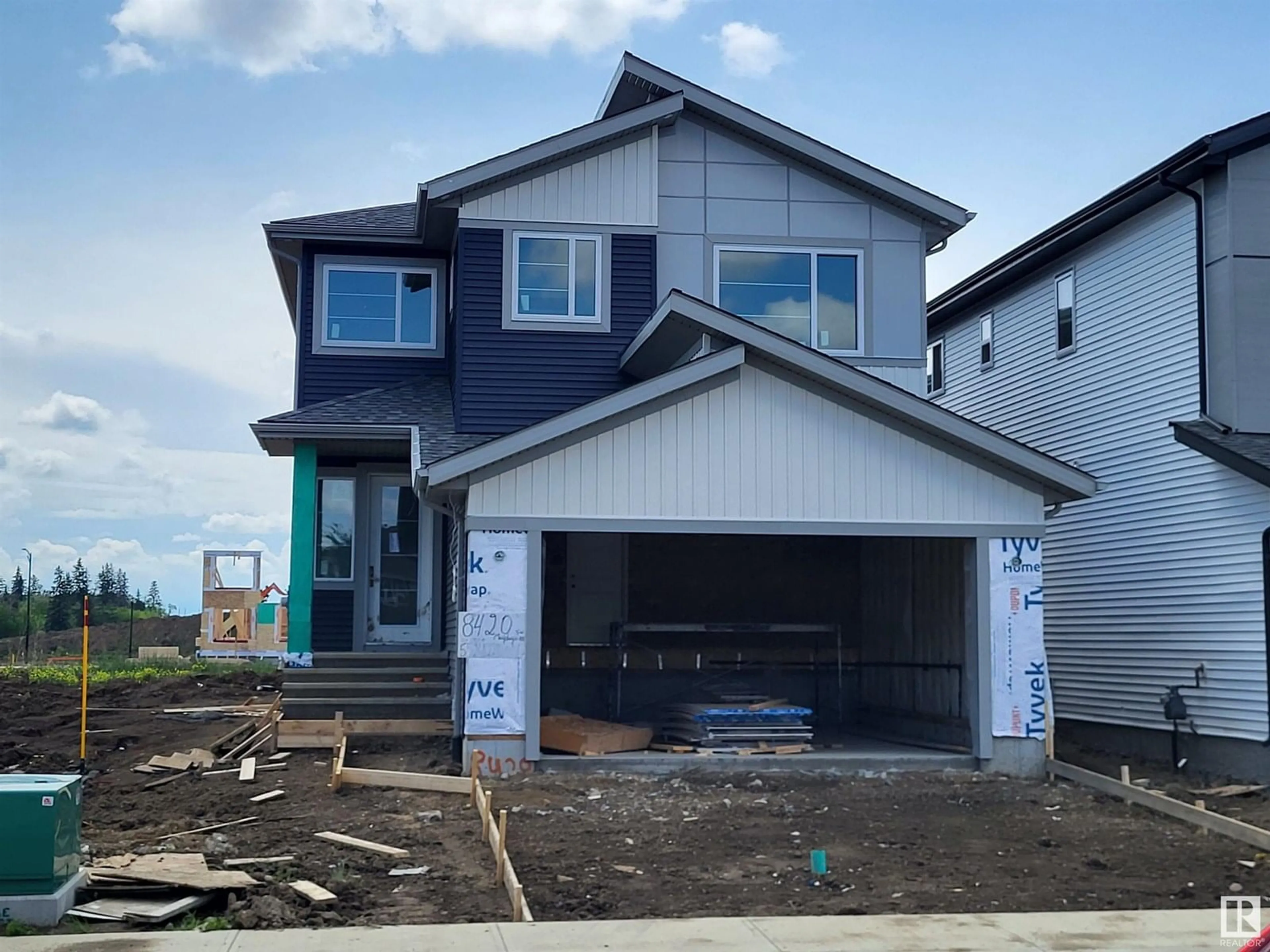 Home with vinyl exterior material, street for SW - 8420 MAYDAY LINK, Edmonton Alberta T6X3G1
