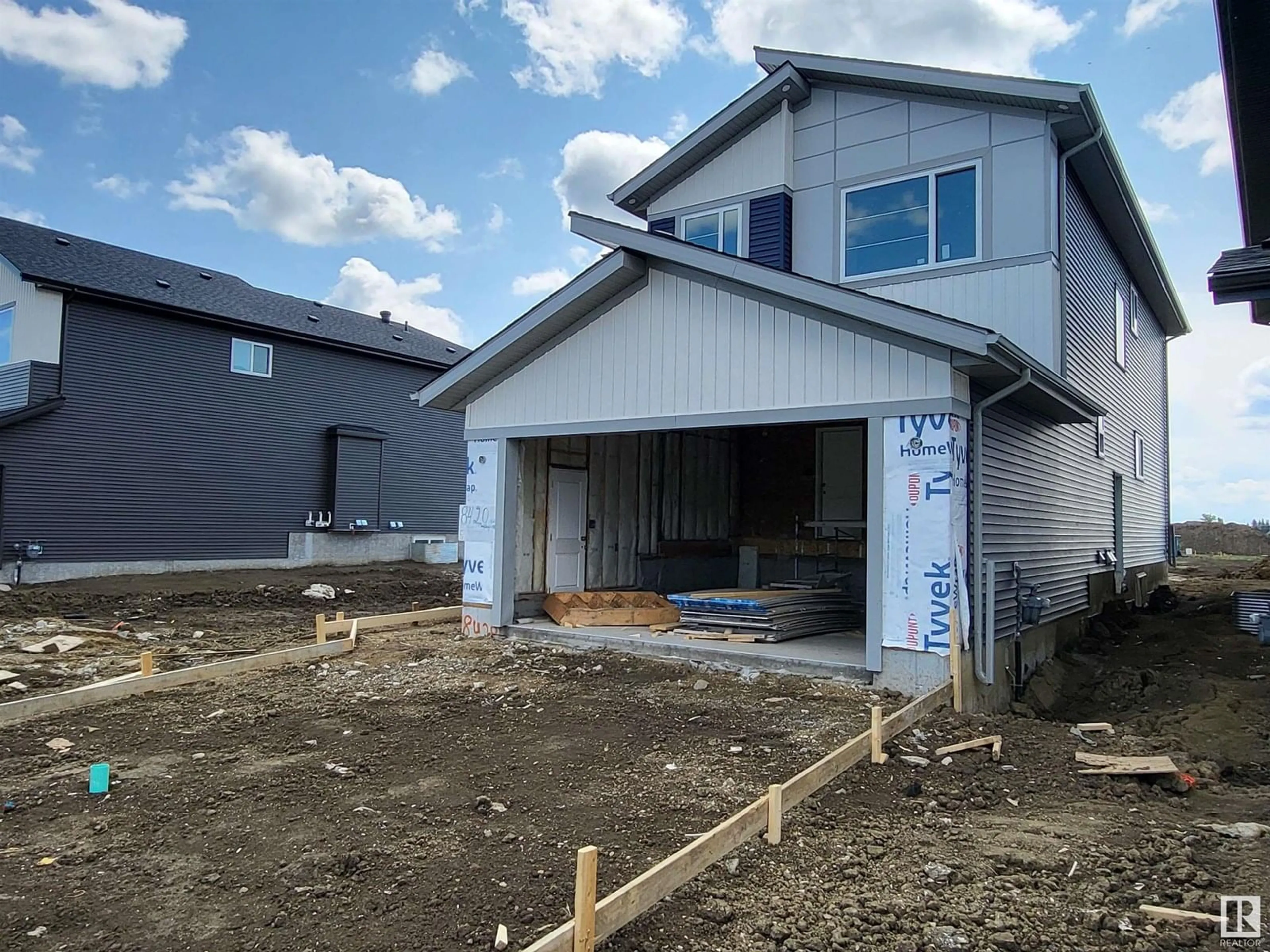Home with vinyl exterior material, building for SW - 8420 MAYDAY LINK, Edmonton Alberta T6X3G1