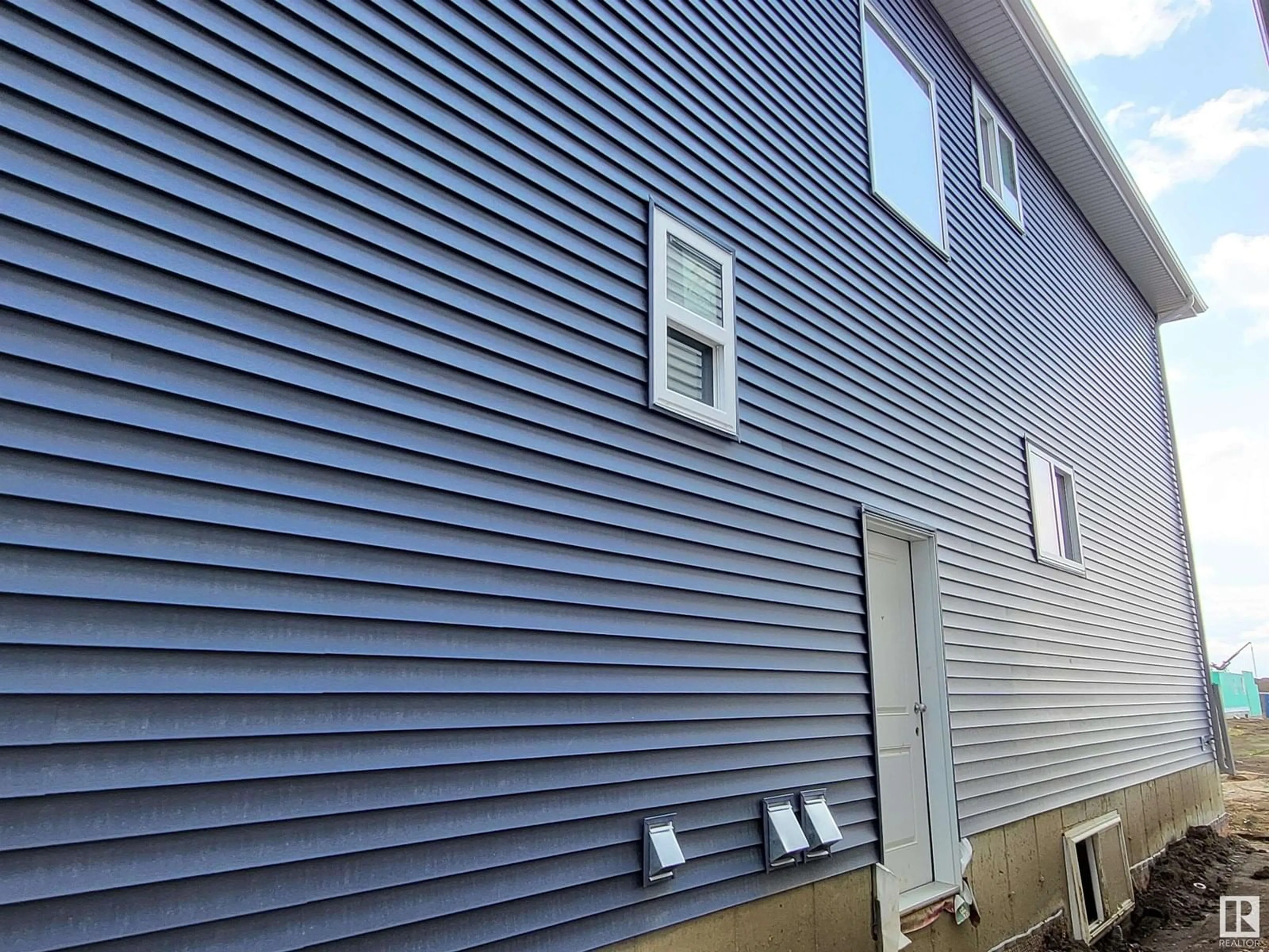 Home with vinyl exterior material, street for SW - 8420 MAYDAY LINK, Edmonton Alberta T6X3G1