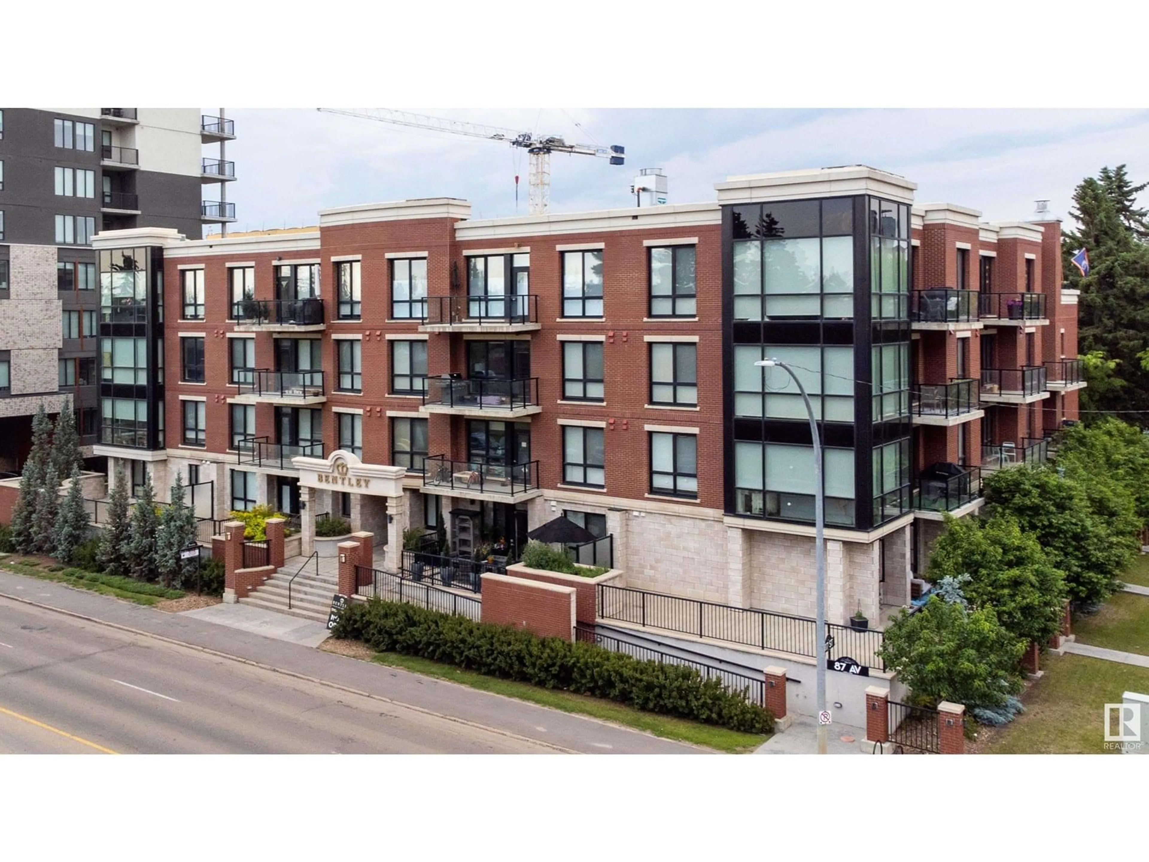 A pic from outside/outdoor area/front of a property/back of a property/a pic from drone, building for #204 - 11710 87 AV, Edmonton Alberta T6G0Y3