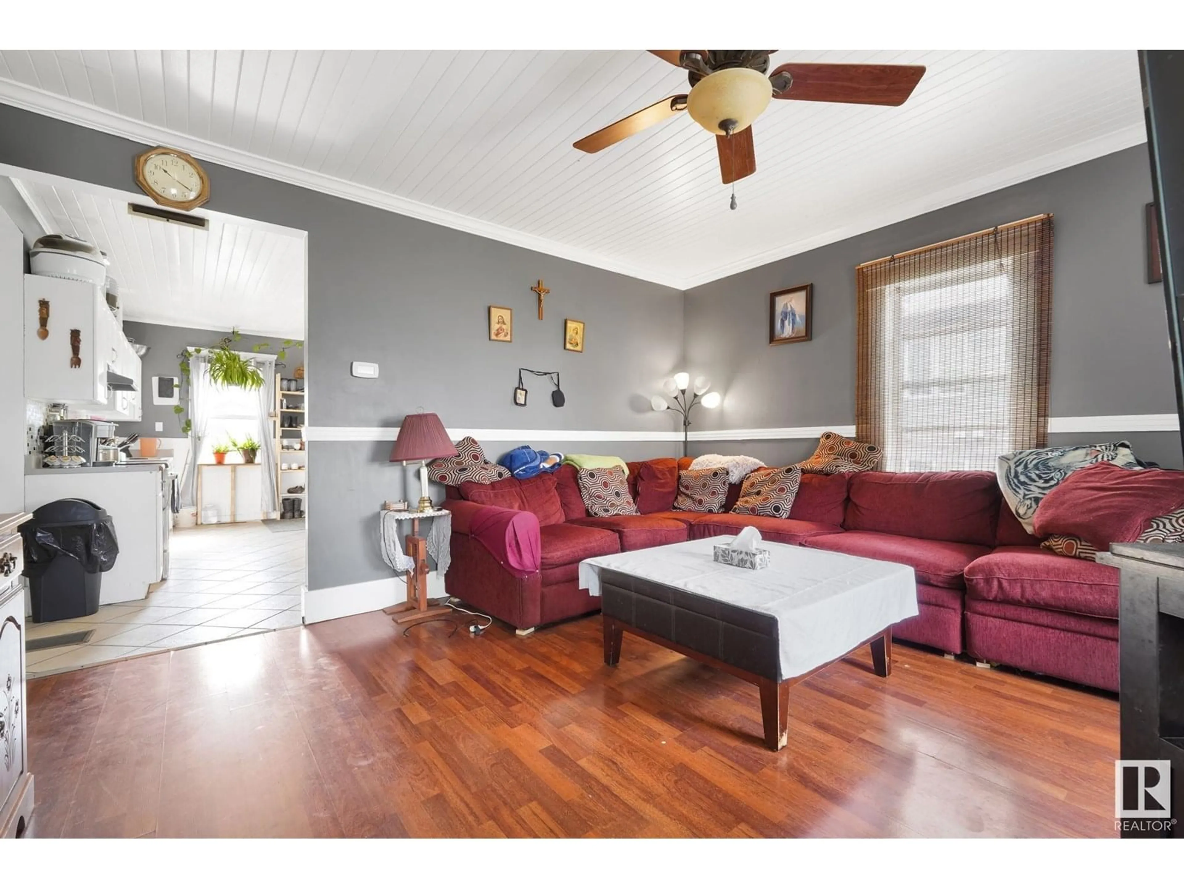 Living room with furniture, wood/laminate floor for 4723 47 ST, Legal Alberta T0G1L0
