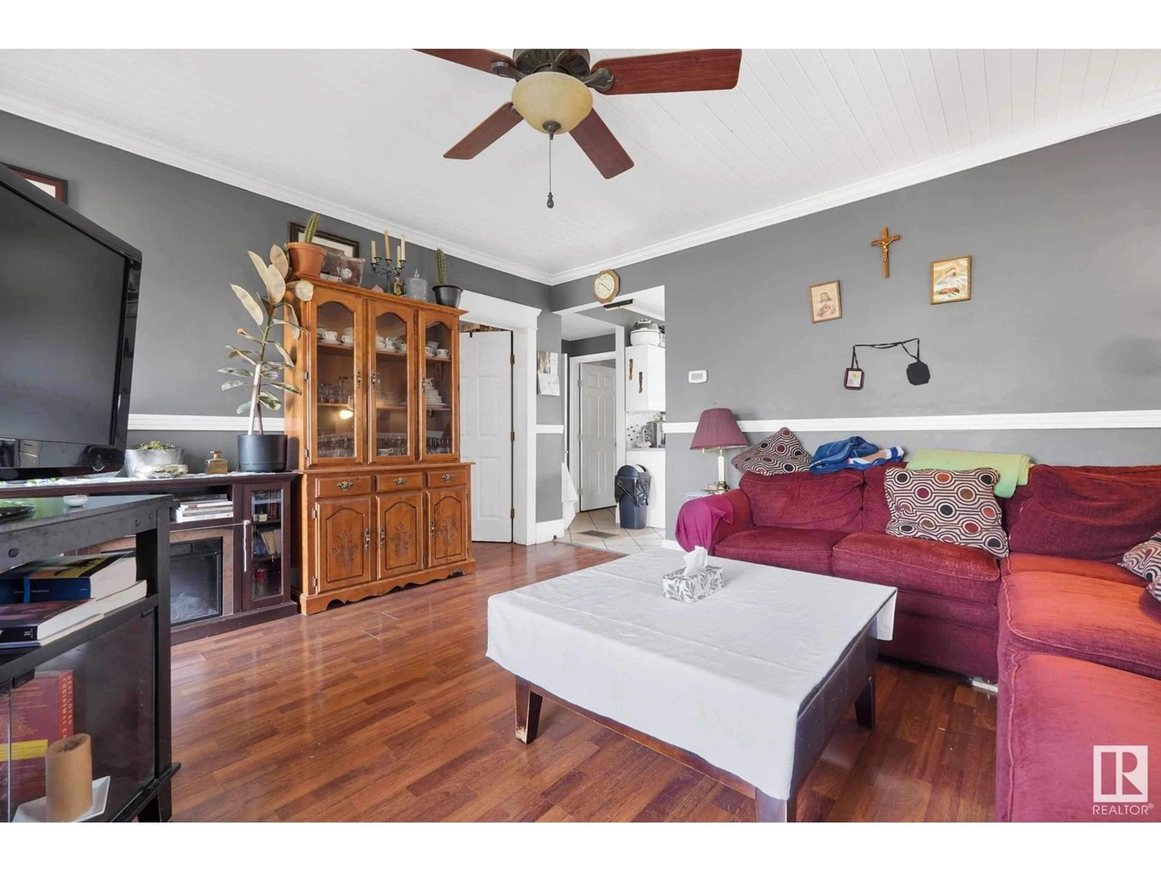 Living room with furniture, wood/laminate floor for 4723 47 ST, Legal Alberta T0G1L0