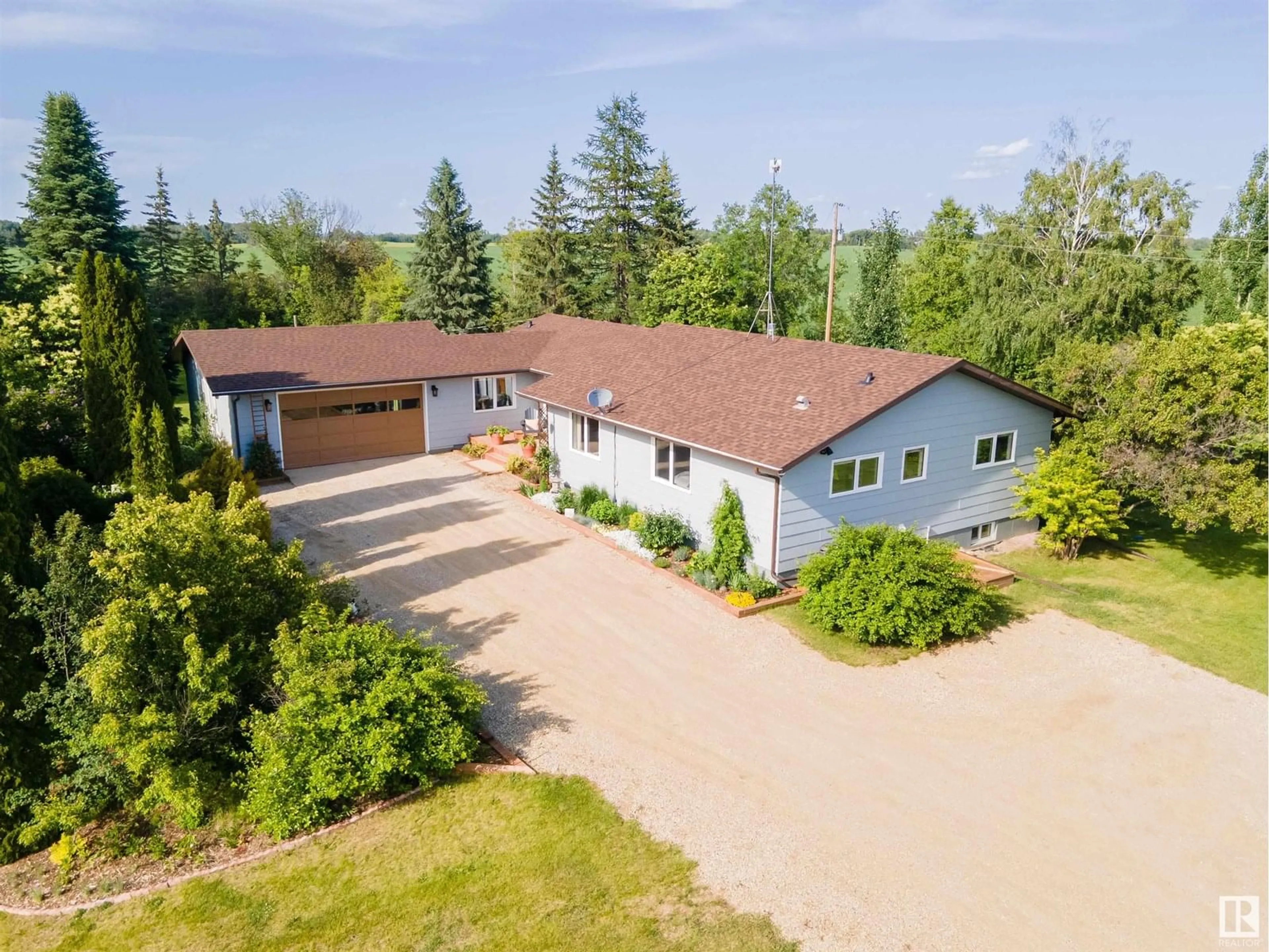 A pic from outside/outdoor area/front of a property/back of a property/a pic from drone, unknown for 1514 TWP ROAD 514, Rural Parkland County Alberta T7Y3J2