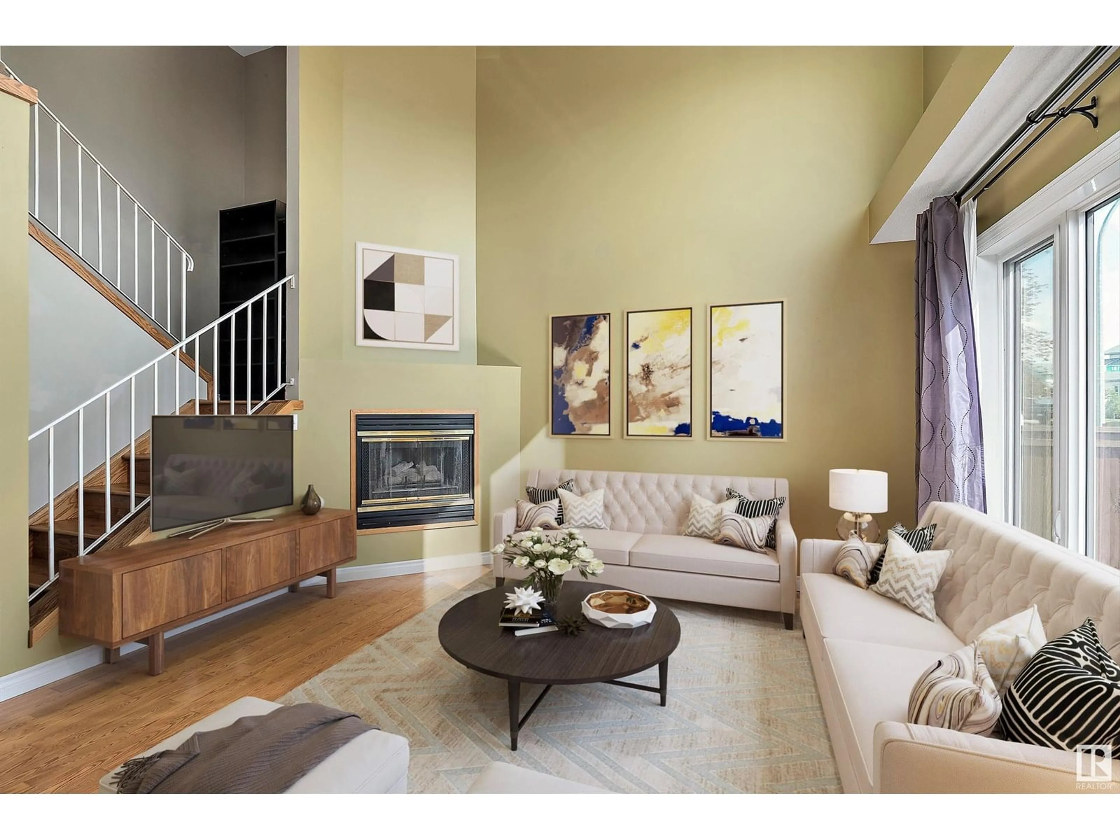 Living room with furniture, wood/laminate floor for 7517 188 ST, Edmonton Alberta T5T5W9