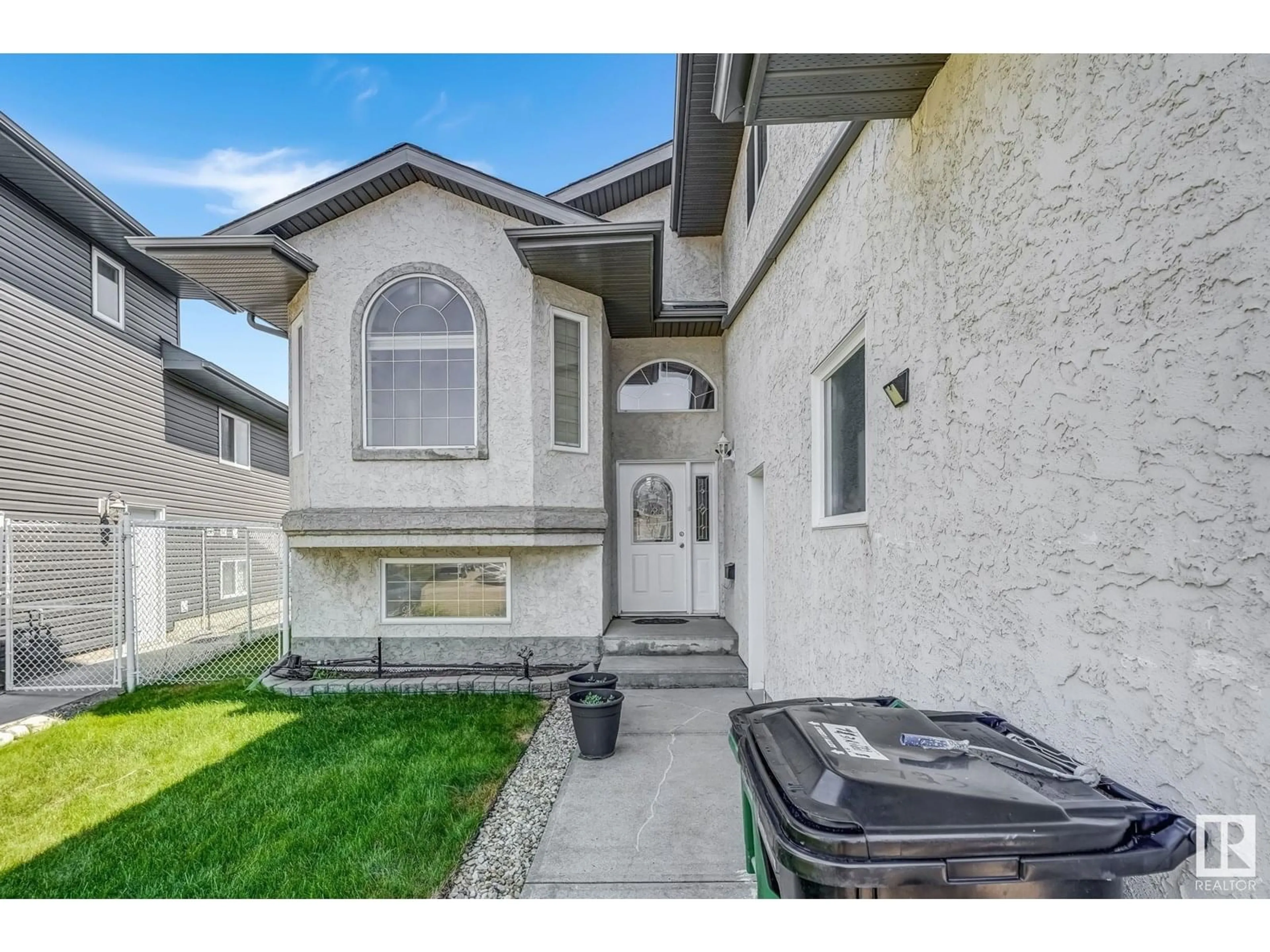 Home with vinyl exterior material, street for 723 KIRKNESS RD, Edmonton Alberta T5Y2Y8