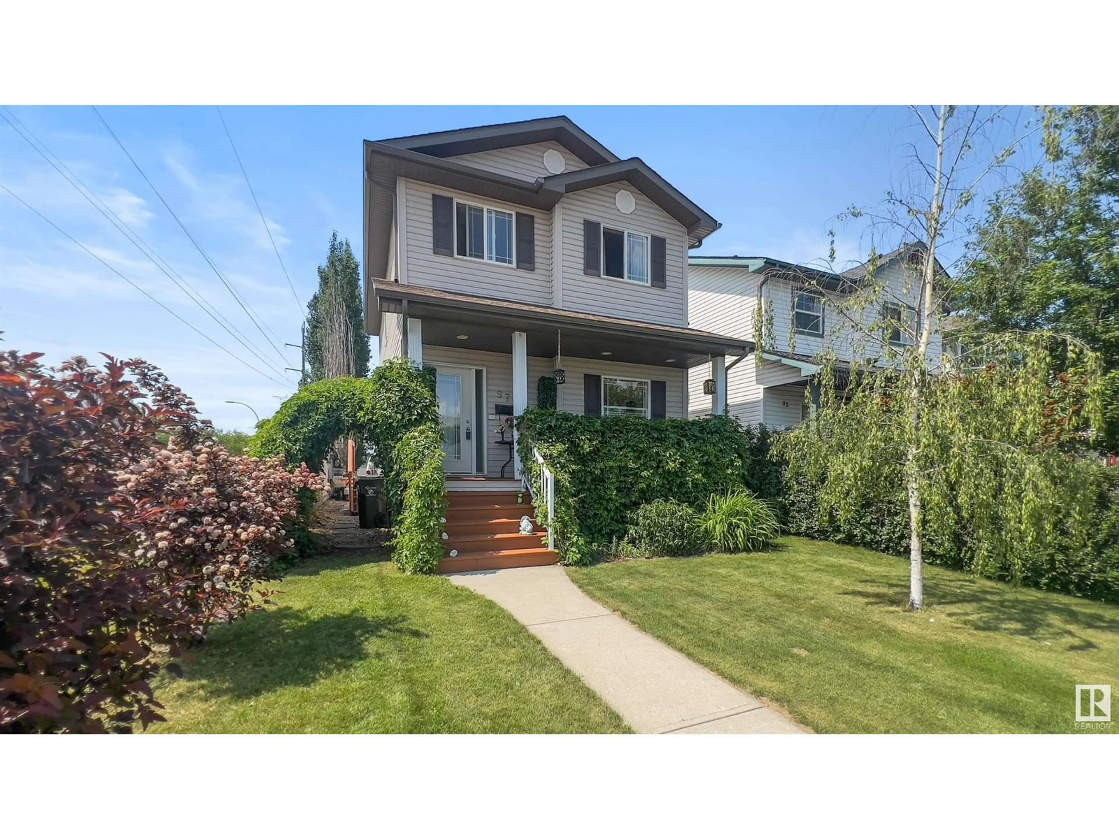 Home with vinyl exterior material, street for 97 ERIE ST, Devon Alberta T9G2G3