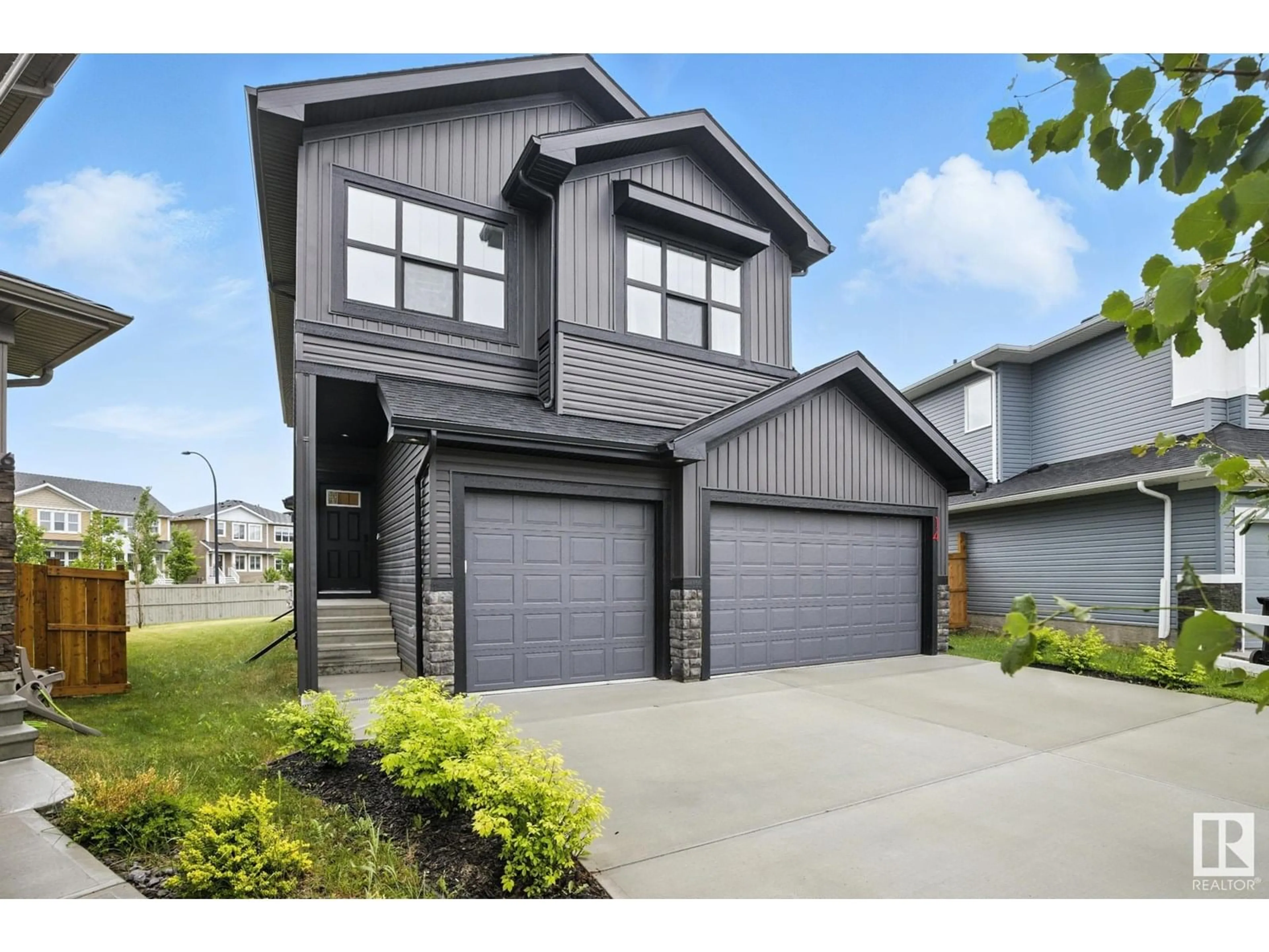 Home with vinyl exterior material, street for 14 ROBERTS CL, Leduc Alberta T9E1K9